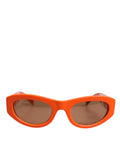 Lunettes de soleil Dolce & Gabbana Orange Reborn To Live avec cadre ovale et logo, design élégant et moderne.
