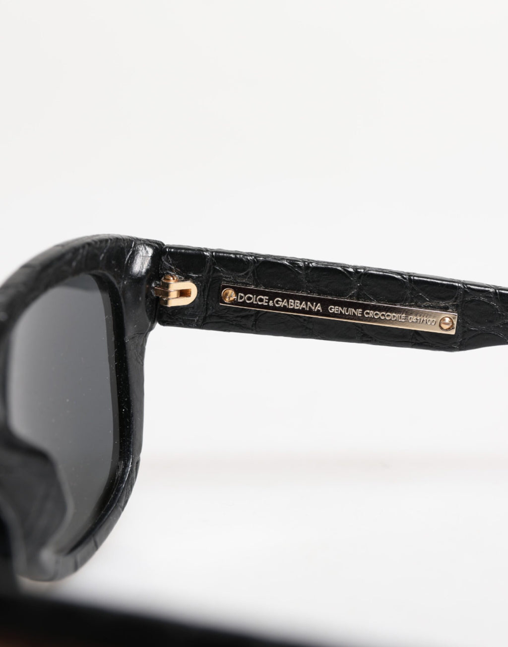 Lunettes de soleil Dolce & Gabbana noires en cuir avec monture en forme de cadre et verres teintés, modèle DG4177.