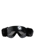 Lunettes de ski Dolce & Gabbana noires avec lentilles miroir en dentelle, masque de ski élégant et tendance.