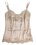 Lingerie beige en dentelle en soie satinée de Dolce & Gabbana, tank top élégant et confortable.