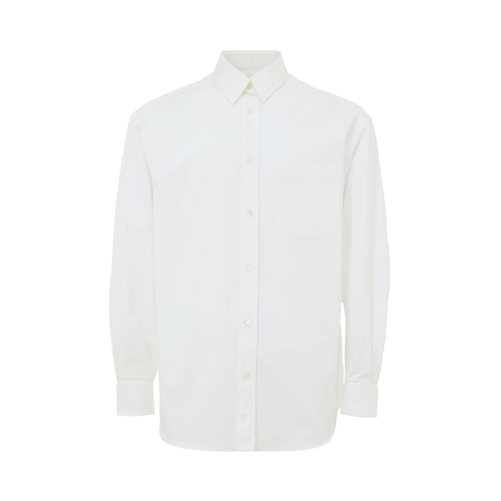 Chemise blanche en coton de Gucci, shirt homme élégante avec col classique et boutonnières visibles.
