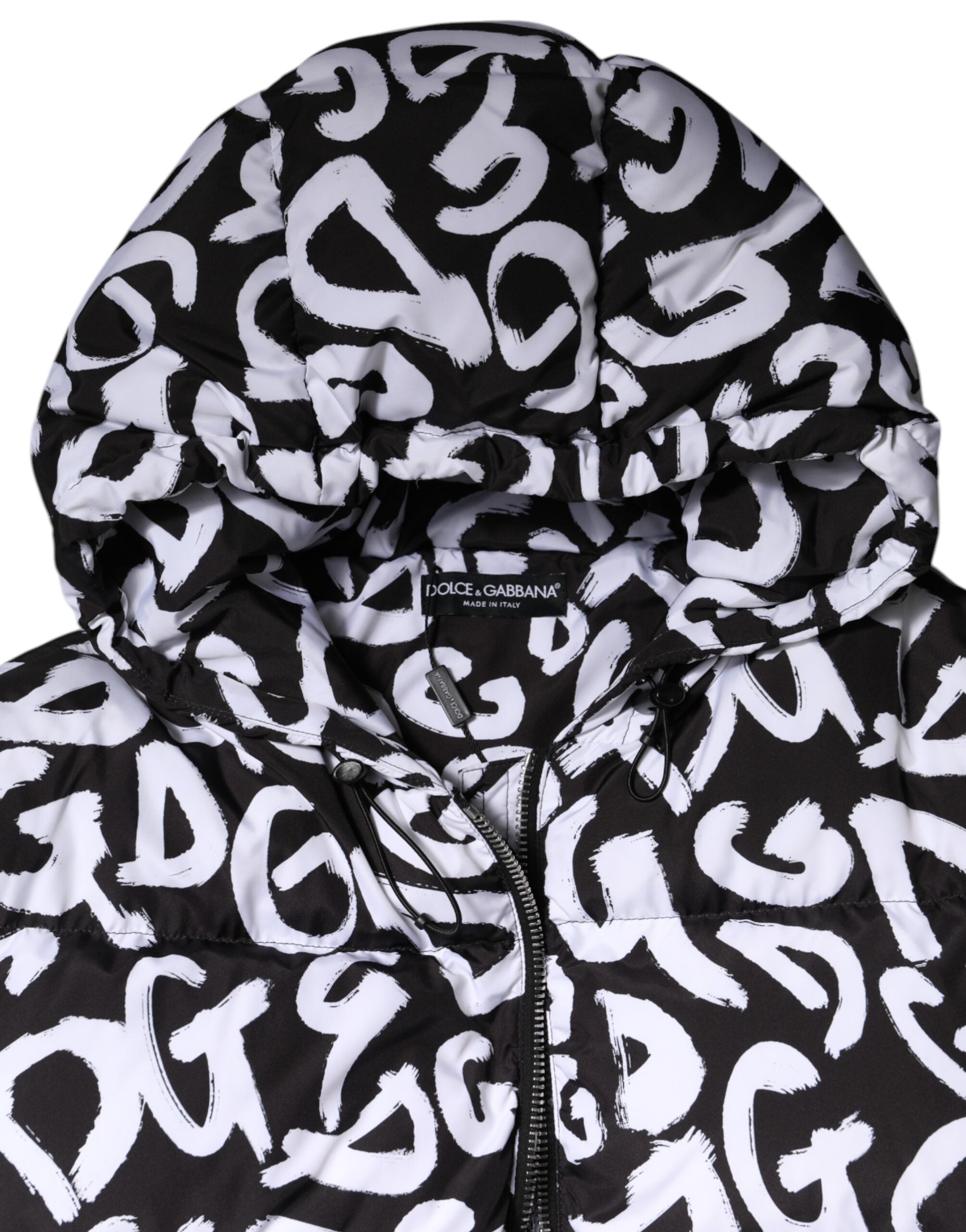 Manteau long à capuche noir et blanc Dolce & Gabbana DG Mania, style élégant avec détails modernes.
