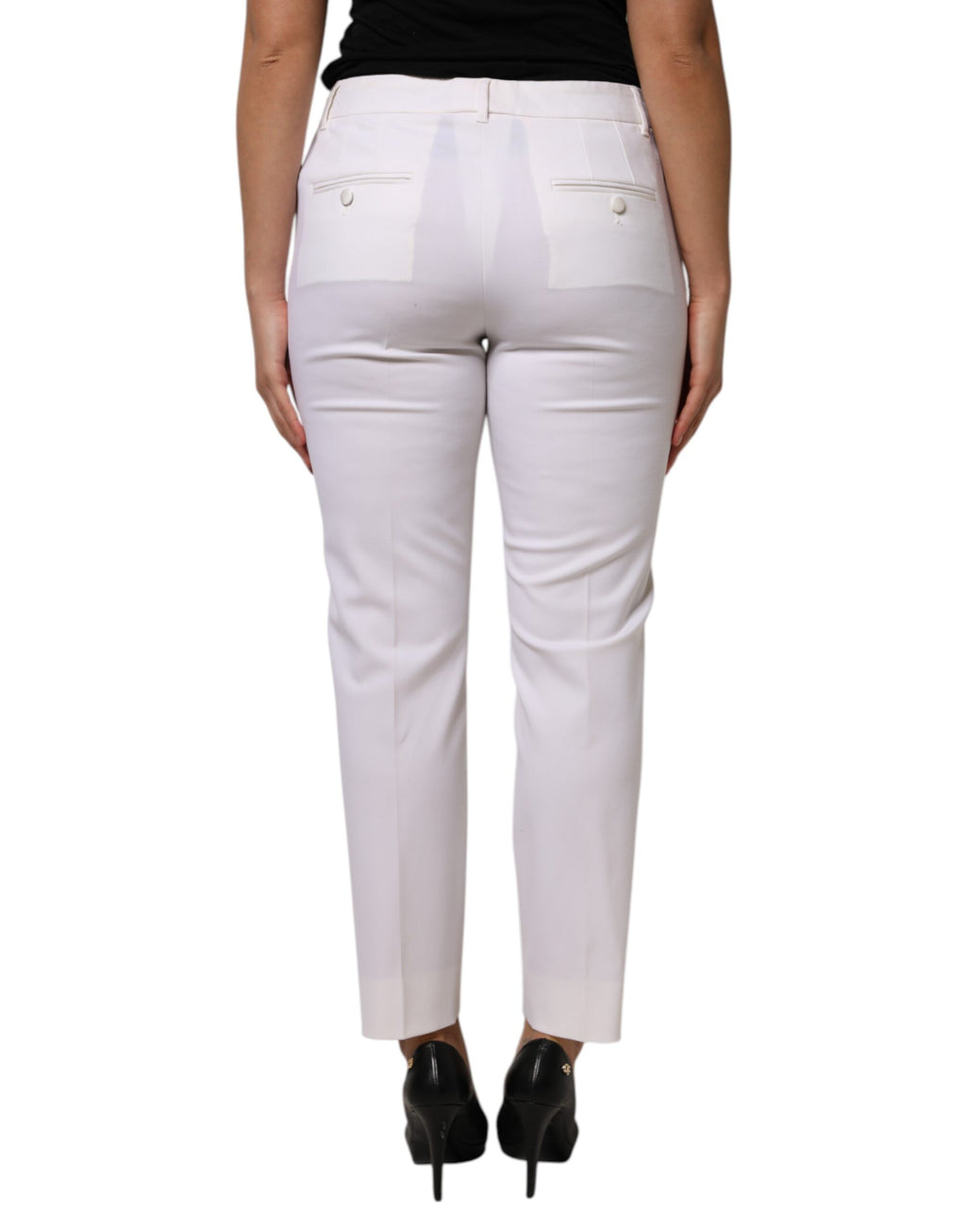 Pantalon en laine blanche Dolce & Gabbana, taille moyenne, coupe tapered, vue de face sur un mannequin.