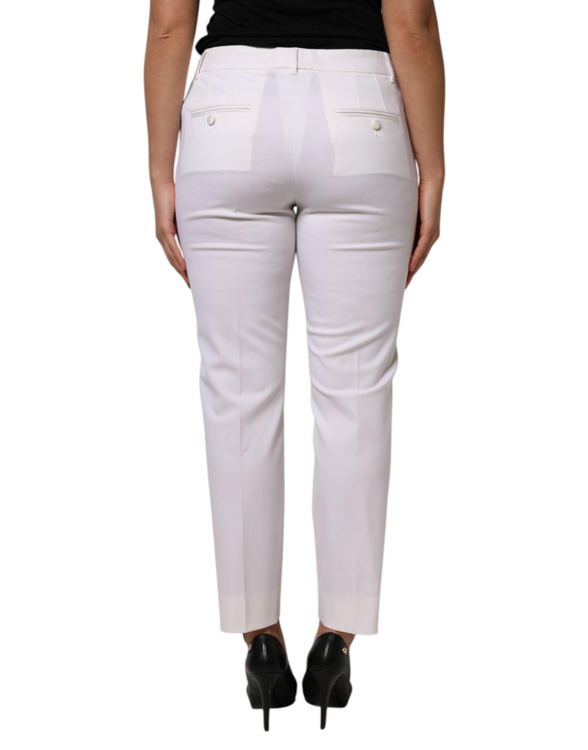 Pantalon en laine blanche Dolce & Gabbana, taille moyenne, coupe tapered, vue de face sur un mannequin.
