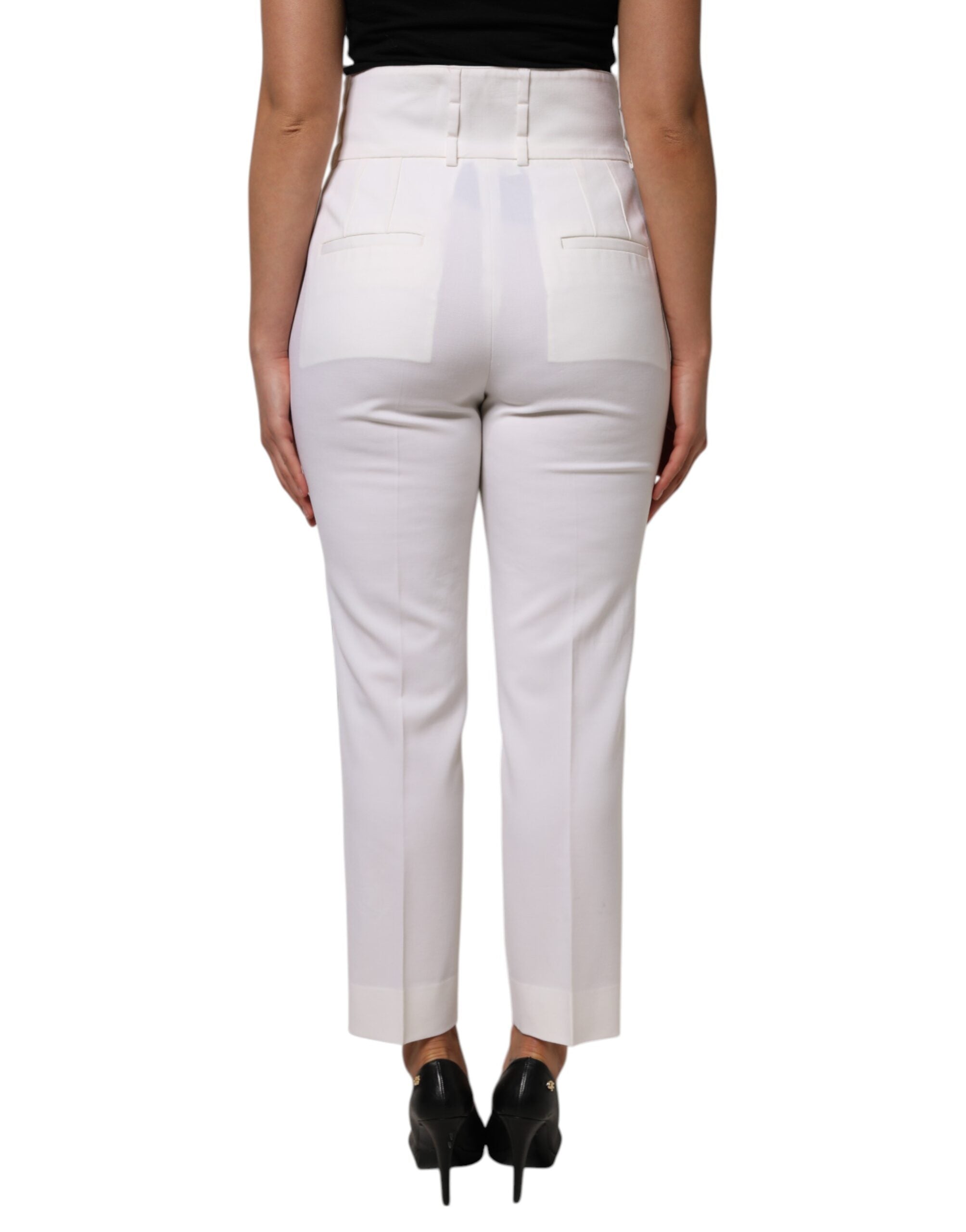 Pantalons en laine blanche Dolce & Gabbana taille haute et coupe tapered, élégants et tendance pour un style sophistiqué.