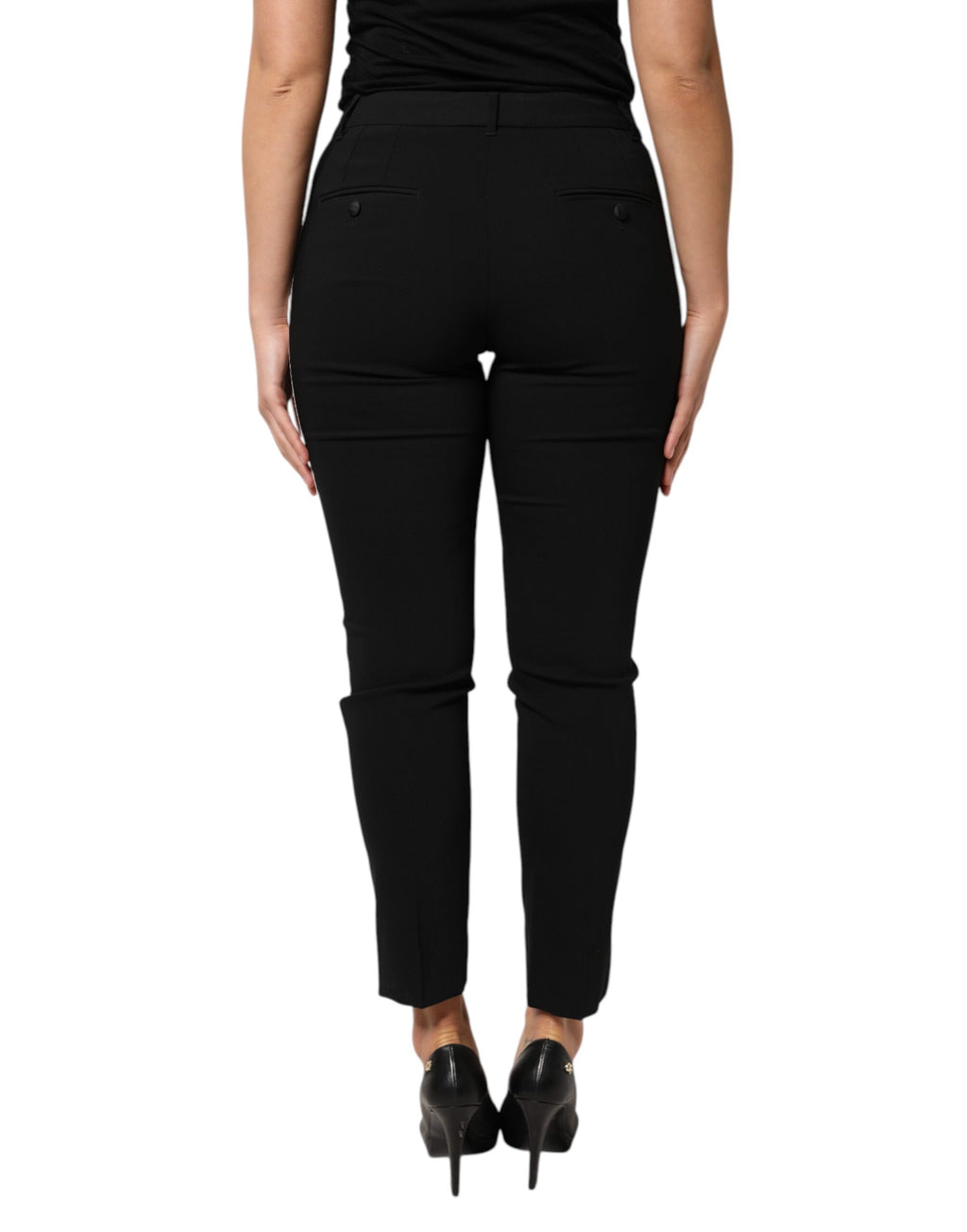 Pantalon noir en laine Dolce & Gabbana à taille haute et coupe tapered, vue de face sur fond blanc.