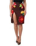 Jupe longue marron à fleurs Dolce & Gabbana, taille haute avec fente sur le côté, tissu élégant et féminin.