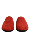 Sandales plates en daim orange Dolce & Gabbana, chaussures décontractées élégantes pour femmes.