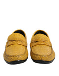 Mocassins Dolce & Gabbana en cuir exotique jaune, chaussons à enfiler élégants, vue de face sur fond neutre.
