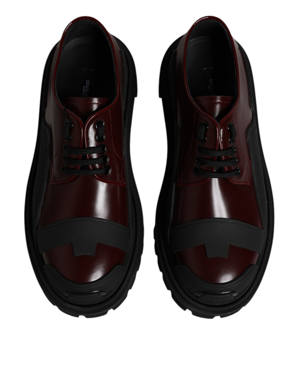 Chaussures de marche en cuir rouge Dolce & Gabbana avec lacets, style élégant et moderne.
