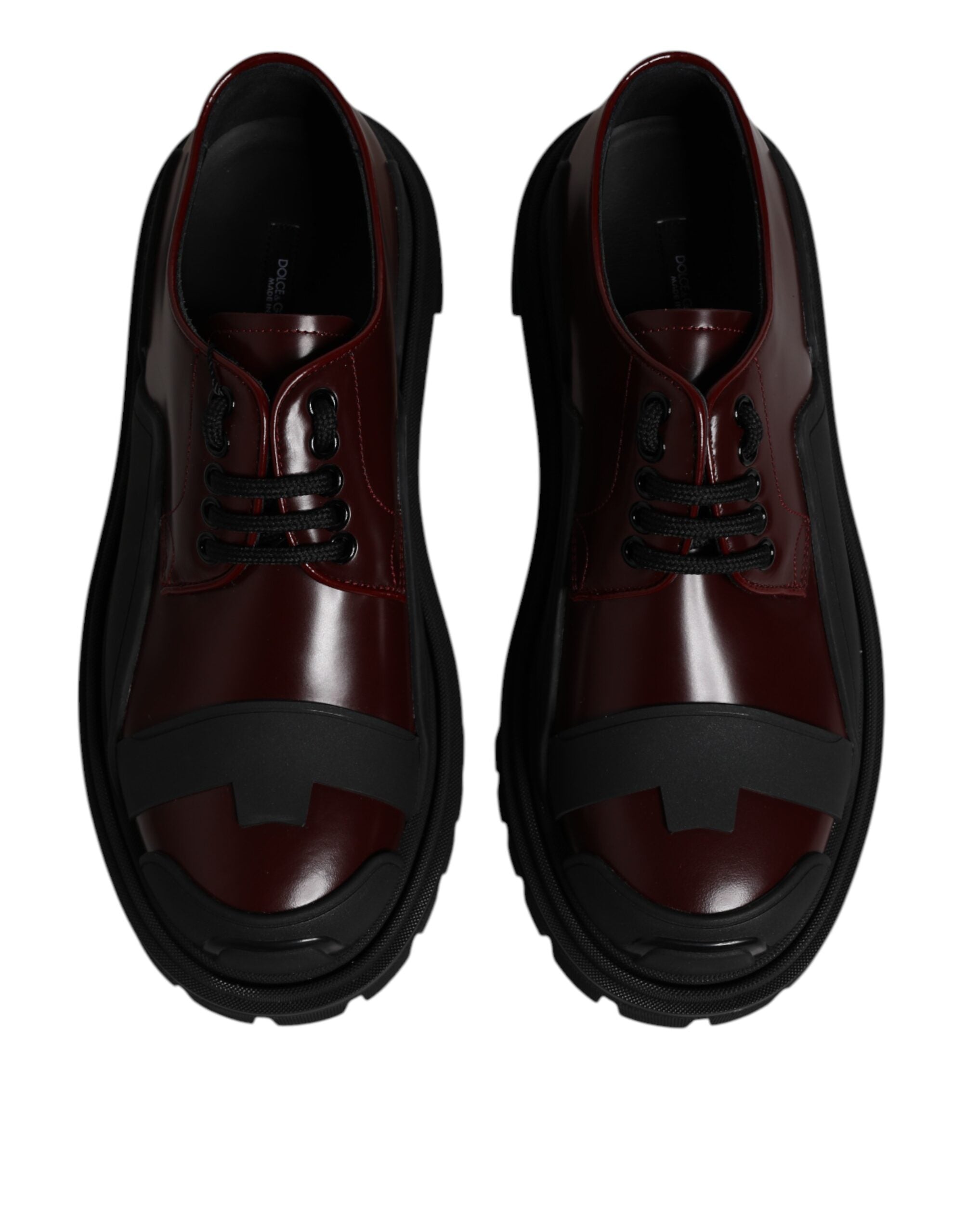 Chaussures de marche en cuir rouge Dolce & Gabbana avec lacets, style élégant et moderne.