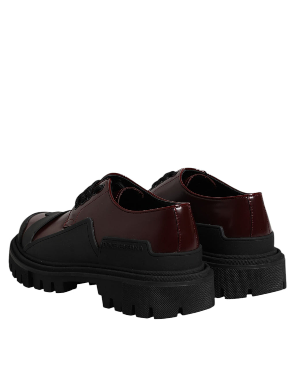 Chaussures de marche en cuir rouge Dolce & Gabbana avec lacets, style trekking, vue de face.