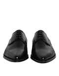 Chaussures Derby en cuir noir Dolce & Gabbana pour homme avec laçage élégant, style sophistiqué et finition de haute qualité.