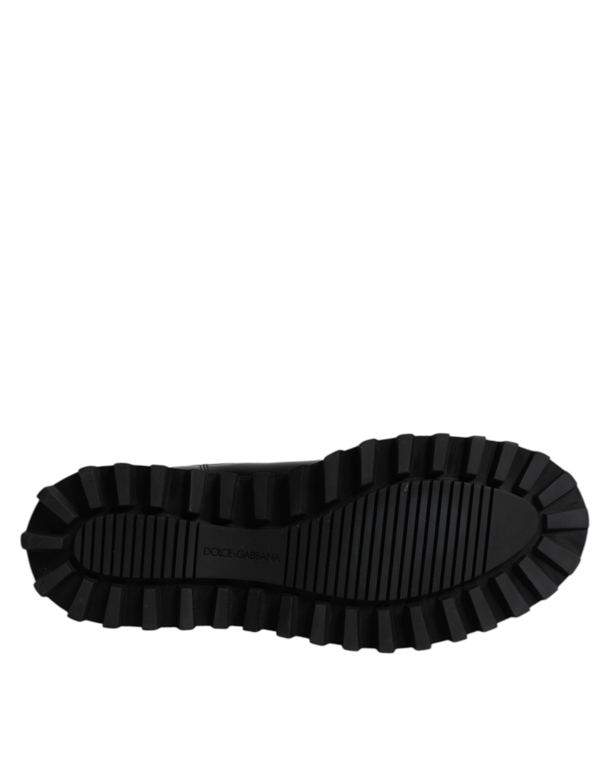 Chaussures Chelsea pour homme Dolce & Gabbana, bottines noires avec boucle et logo DG, style élégant et moderne.
