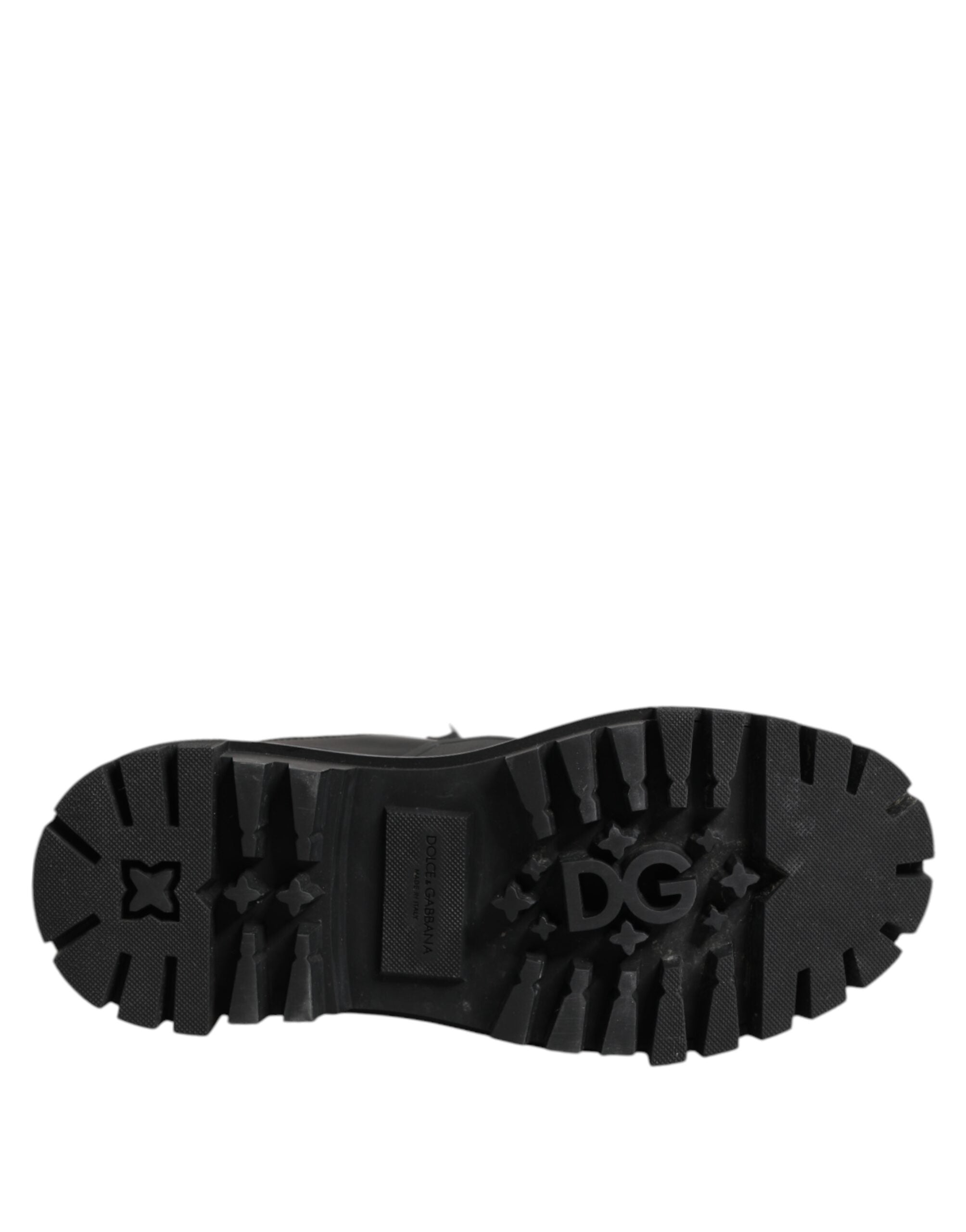 Chaussures bottines courtes Dolce & Gabbana noires et blanches avec lacets rembourrés, style élégant et tendance.