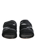 Sandales noires Dolce & Gabbana à enfiler, chaussures élégantes en cuir avec design épuré et confort moderne.