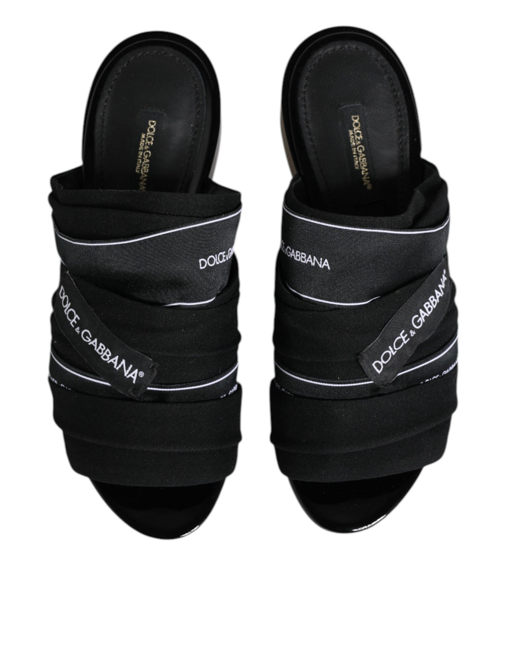 Sandales Dolce & Gabbana noires à enfiler, chaussures élégantes en cuir avec design minimaliste.