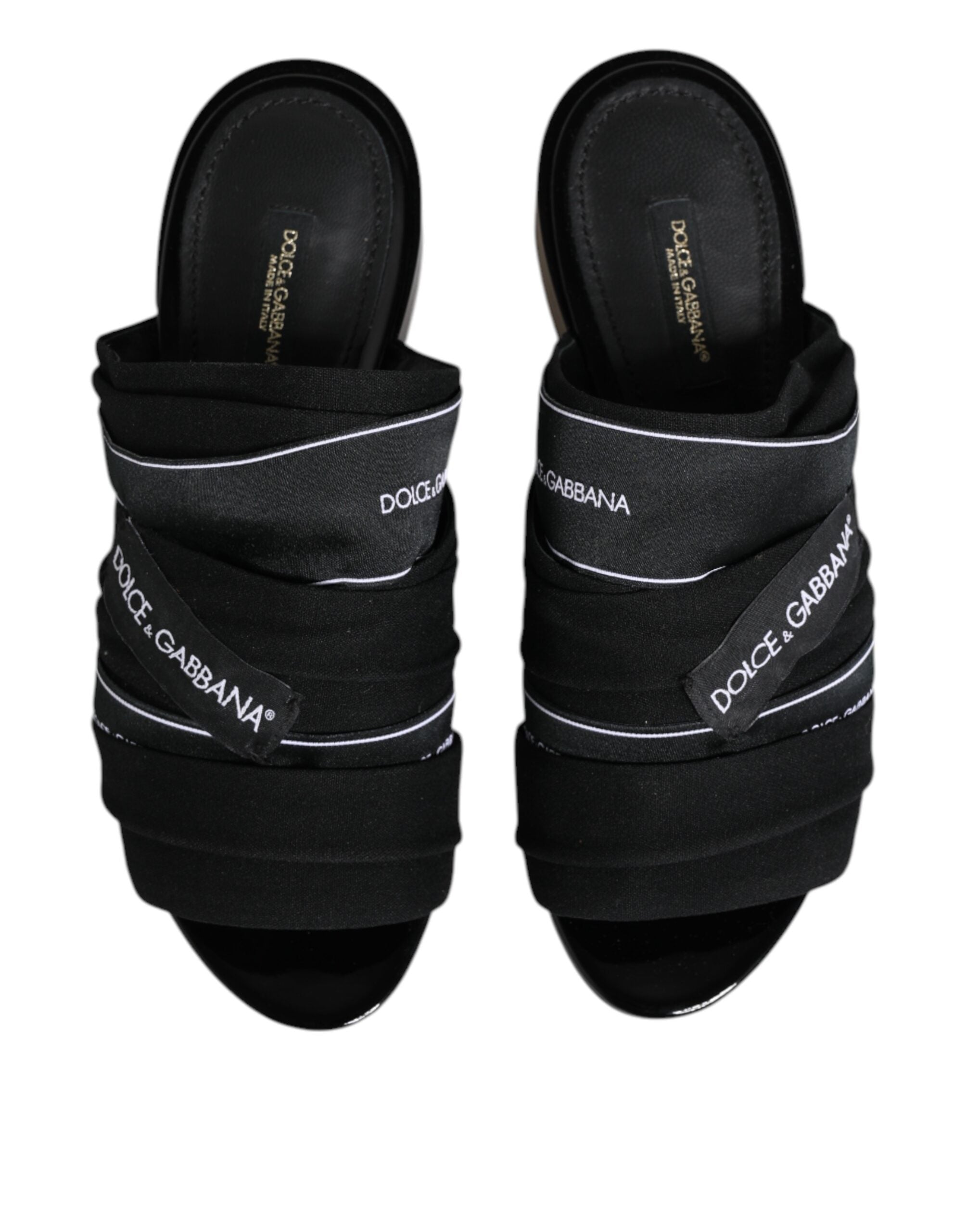Sandales Dolce & Gabbana noires à enfiler, chaussures élégantes en cuir avec design minimaliste.
