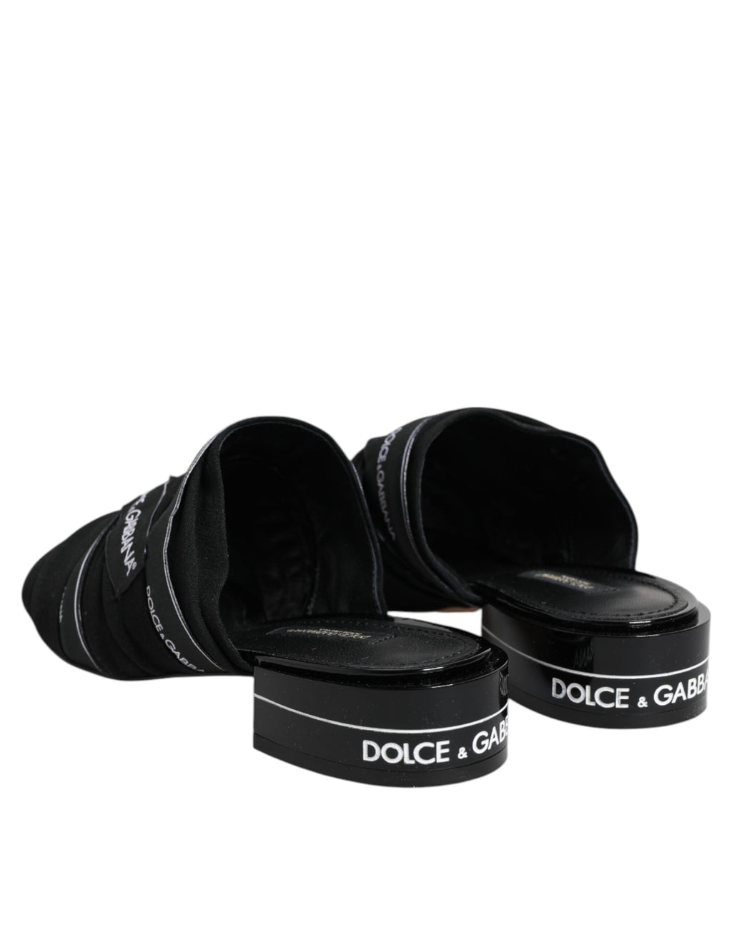 Sandales Dolce & Gabbana noires à enfiler, chaussure slip-on élégante avec design moderne et confort visible.