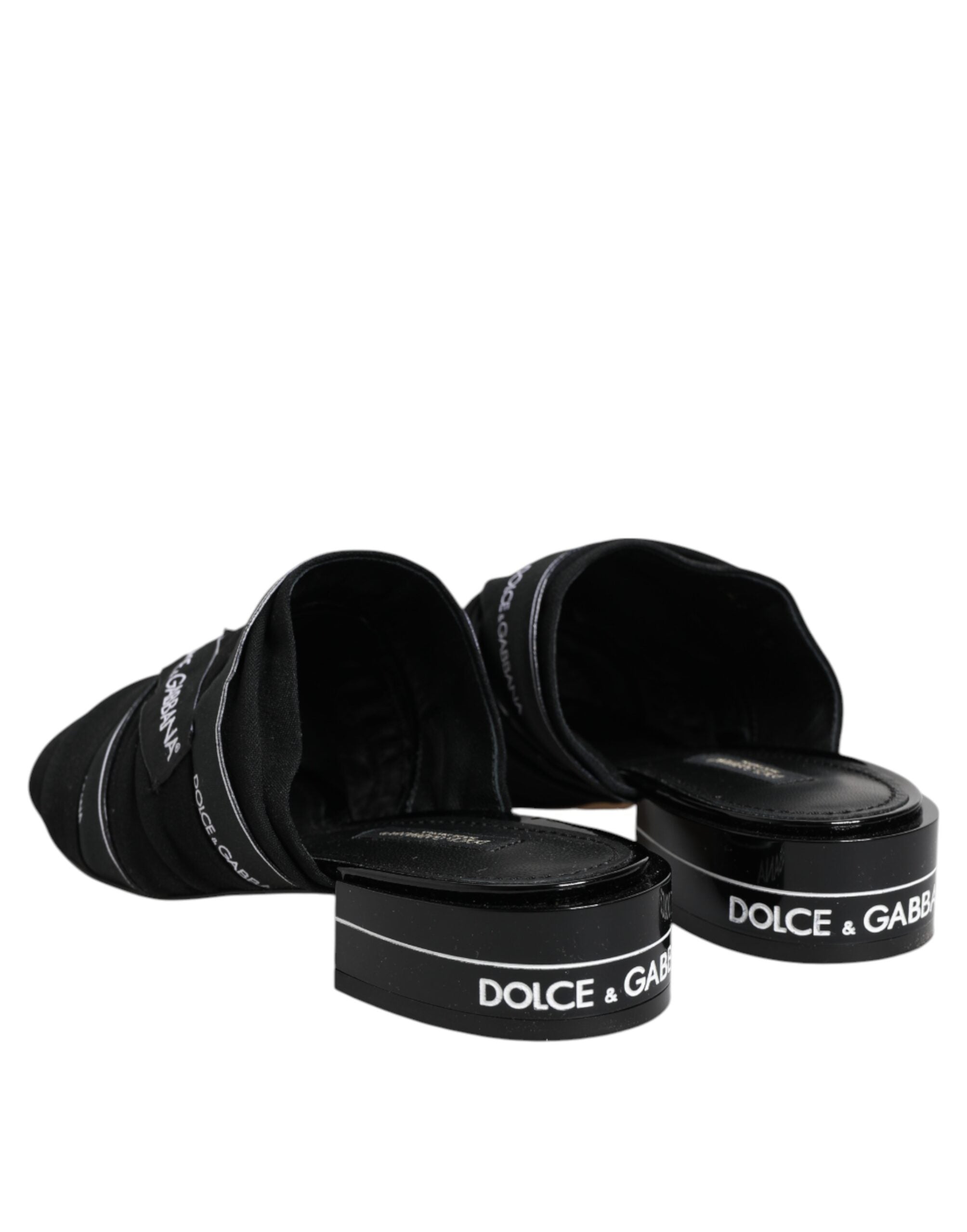 Sandales Dolce & Gabbana noires à enfiler, chaussure slip-on élégante avec design moderne et confort visible.