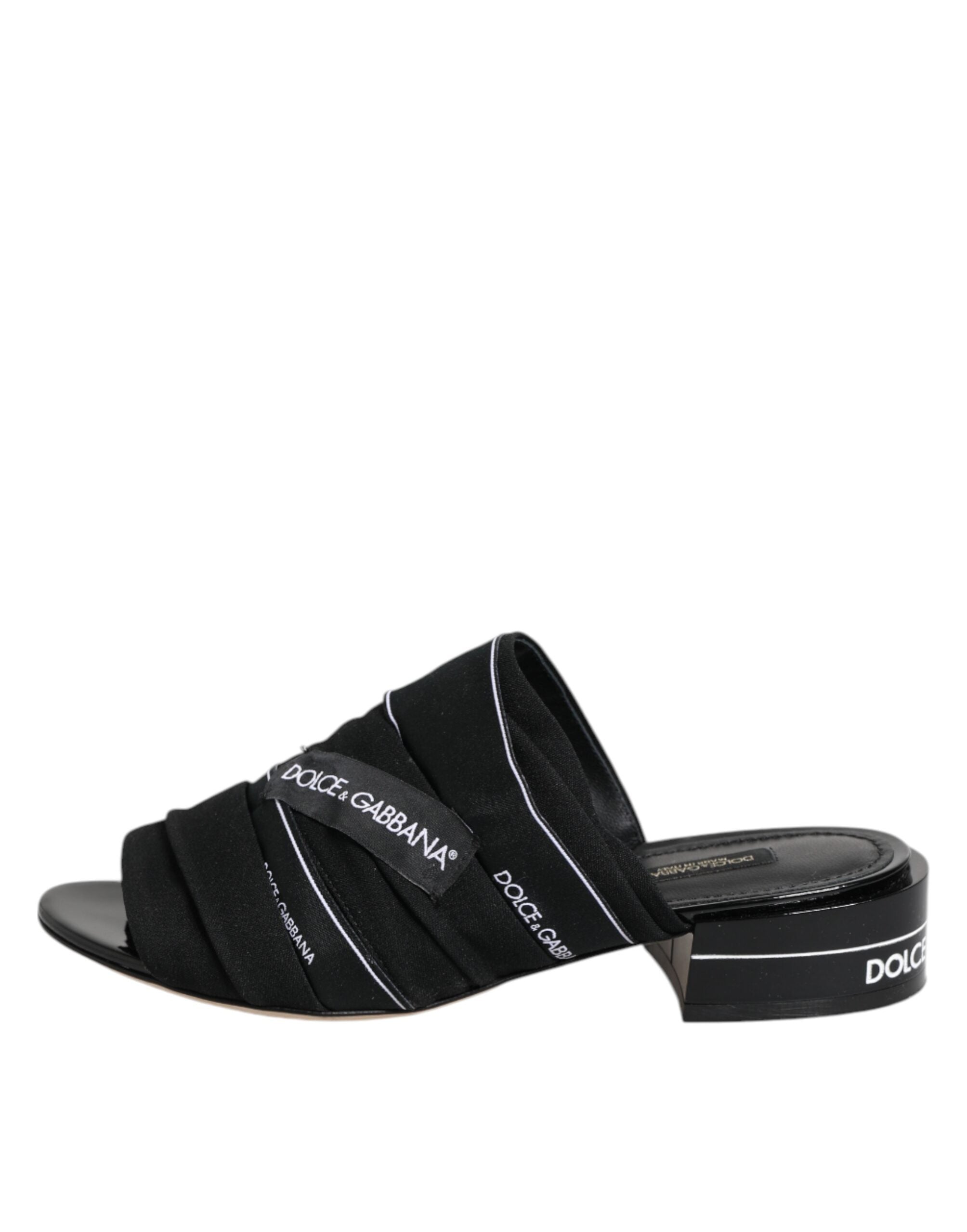 Sandales noires Dolce & Gabbana, slips-on, chaussures de plage ou décontractées, en cuir avec design élégant.