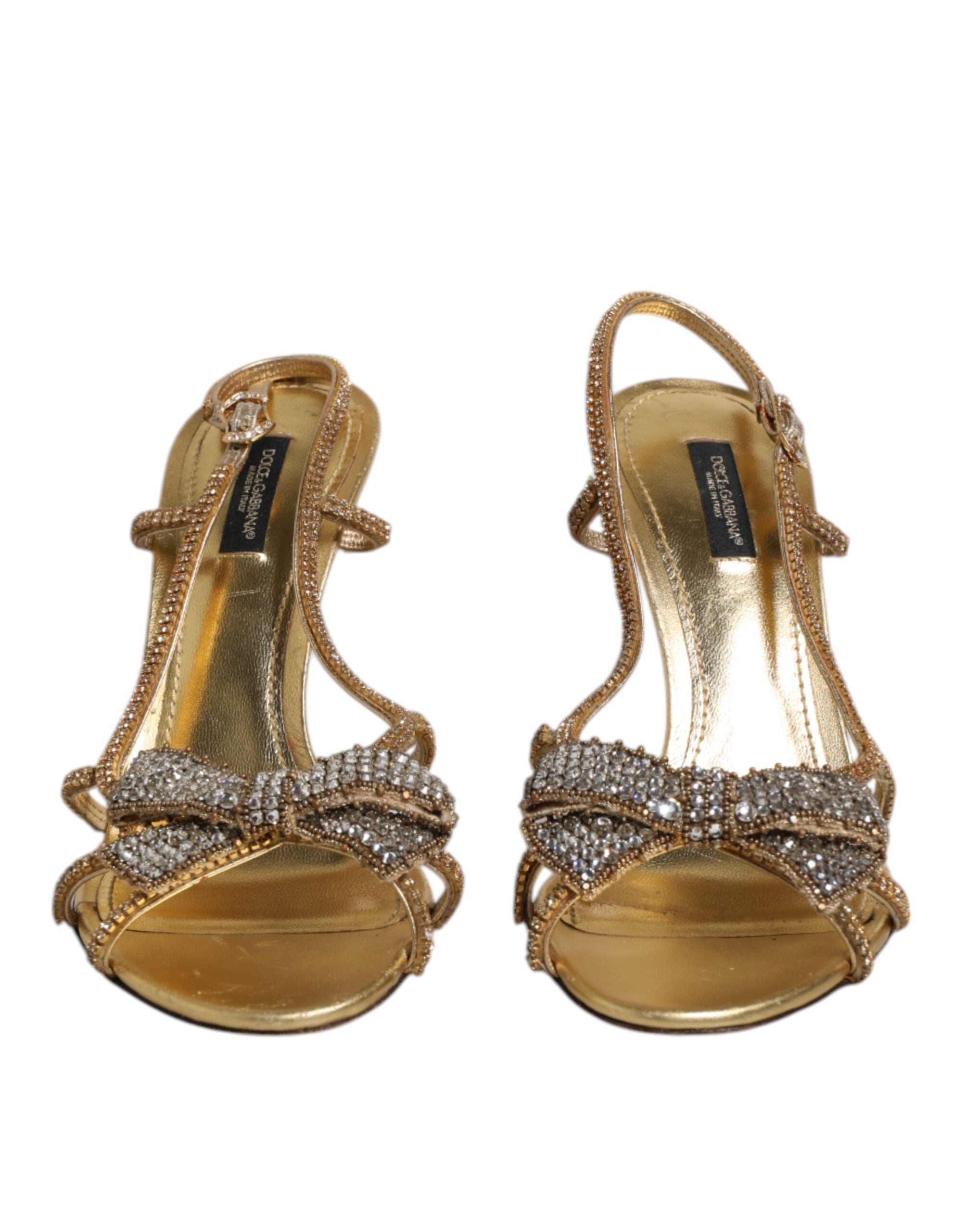 Sandales à talons dorés Dolce & Gabbana avec bride à la cheville ornée de strass, élégantes et sophistiquées.