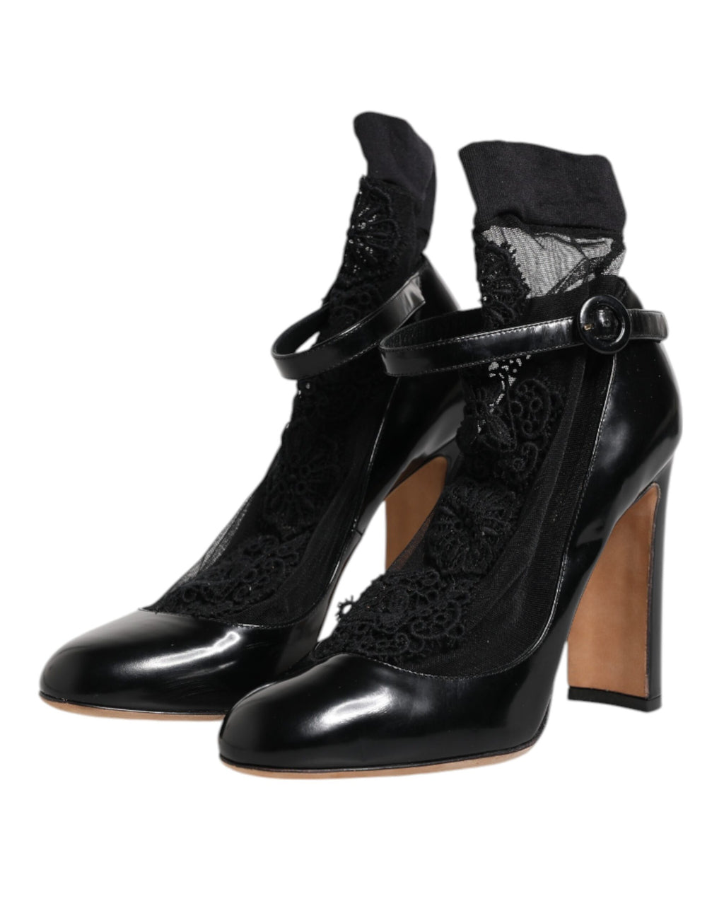 Chaussures pump à talons en cuir noir Dolce & Gabbana avec lacets, style élégant et sophistiqué.