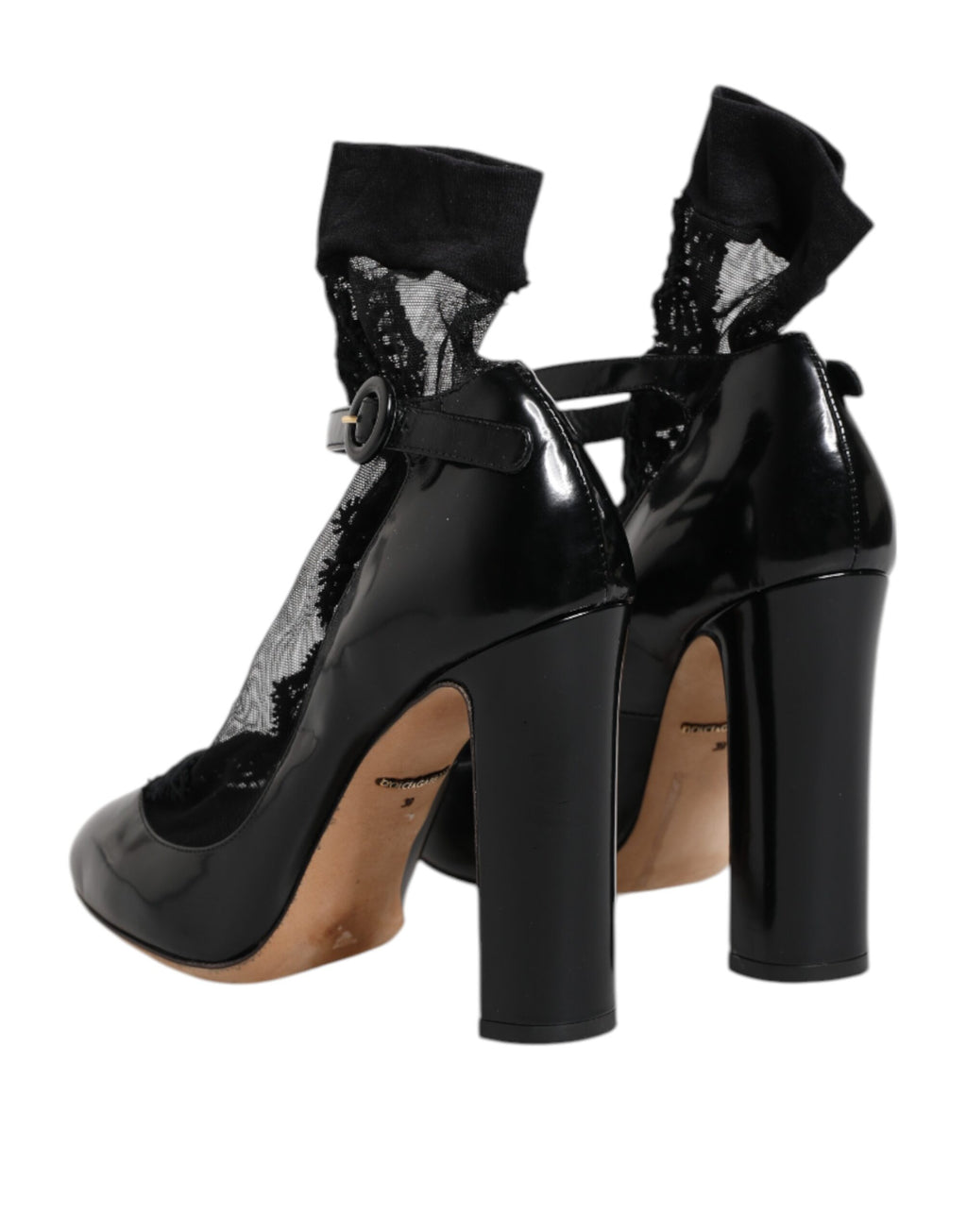 Chaussures Dolce & Gabbana en cuir noir avec talons et lacets, style pompe élégante et sophistiquée.