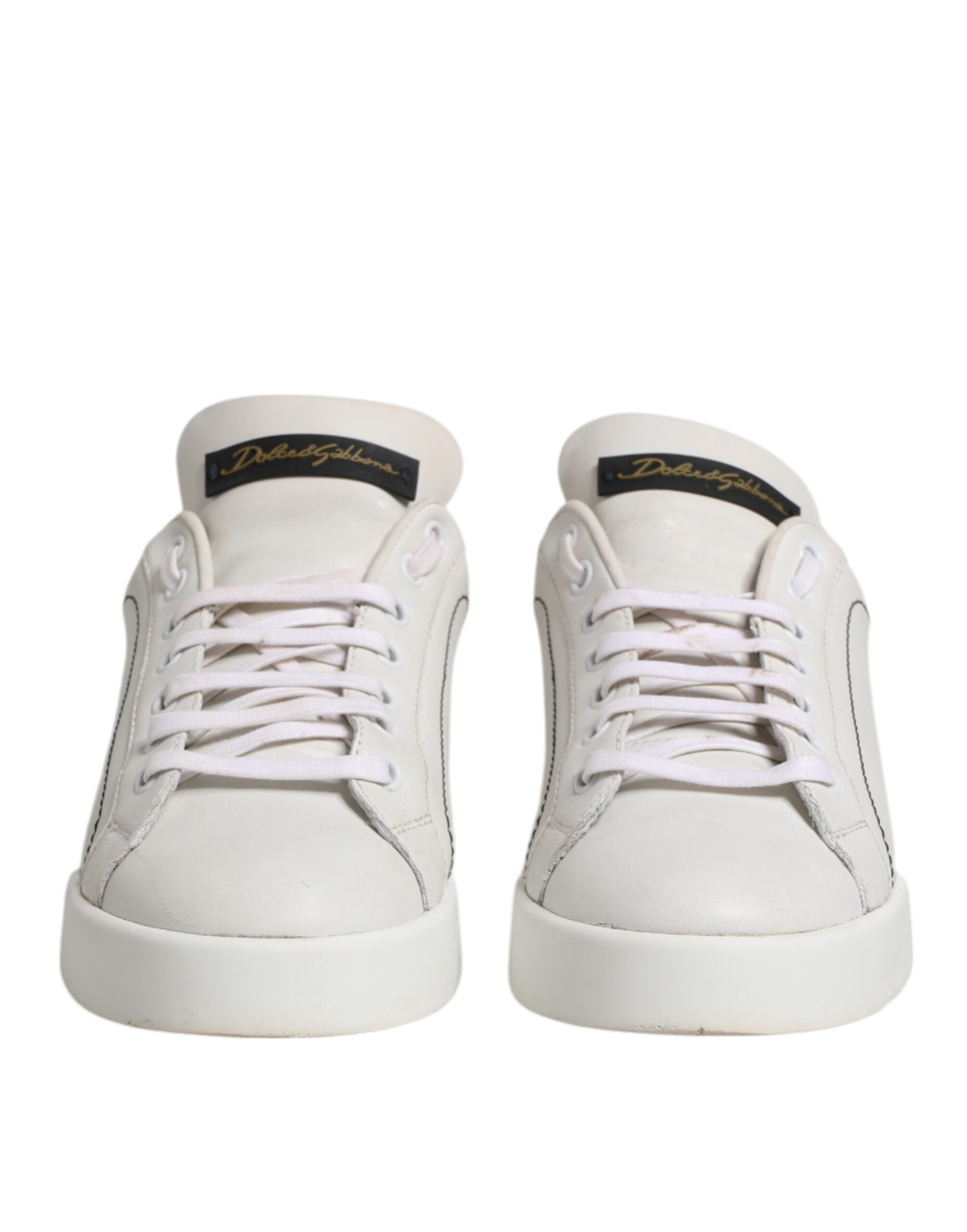 Chaussures sneakers basses Dolce & Gabbana en cuir blanc et or, style décontracté et élégant.