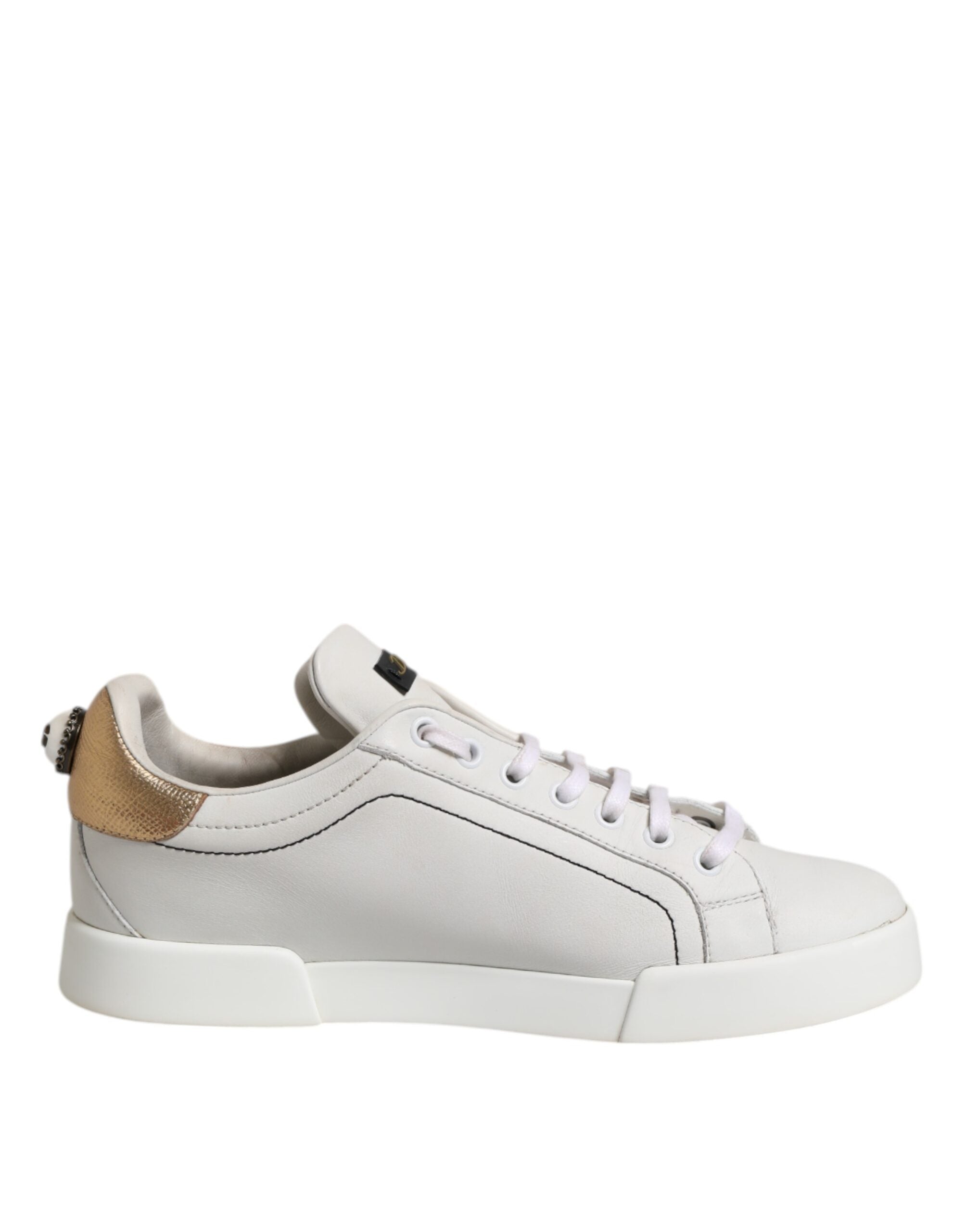 Chaussures basses Dolce & Gabbana en cuir blanc et or, baskets élégantes avec semelle blanche.