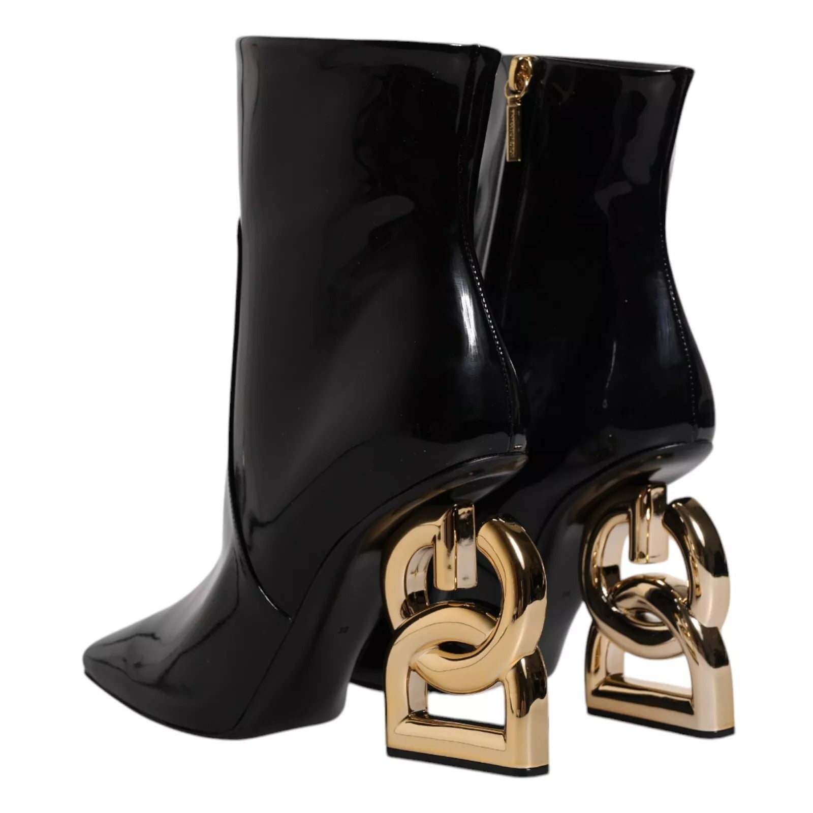 Bottes noires en cuir mi-mollet Dolce & Gabbana Jackie, style élégant et moderne, visibles avec détail en cuir brillant.