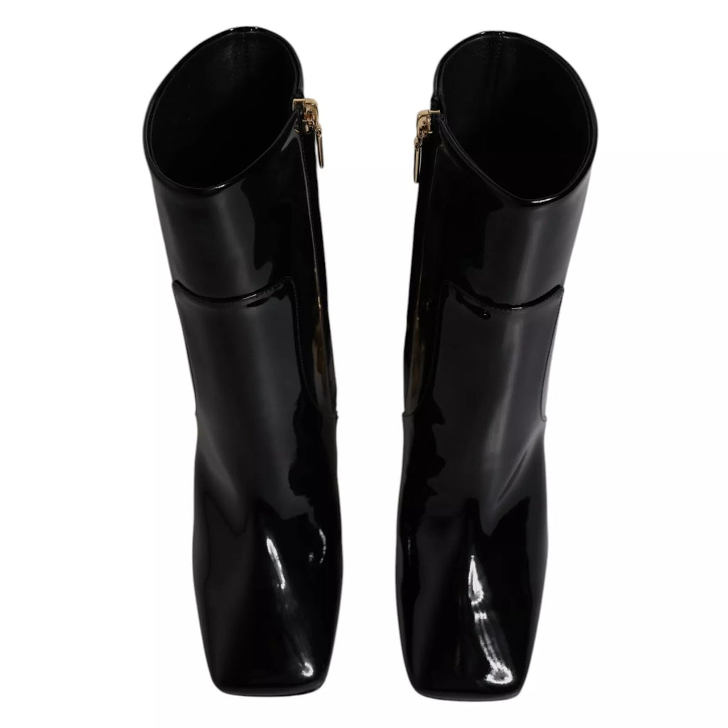 Bottes en cuir noir Dolce & Gabbana Jackie, bottines mi-mollet élégantes avec détails sophistiqués visibles dans l'image.