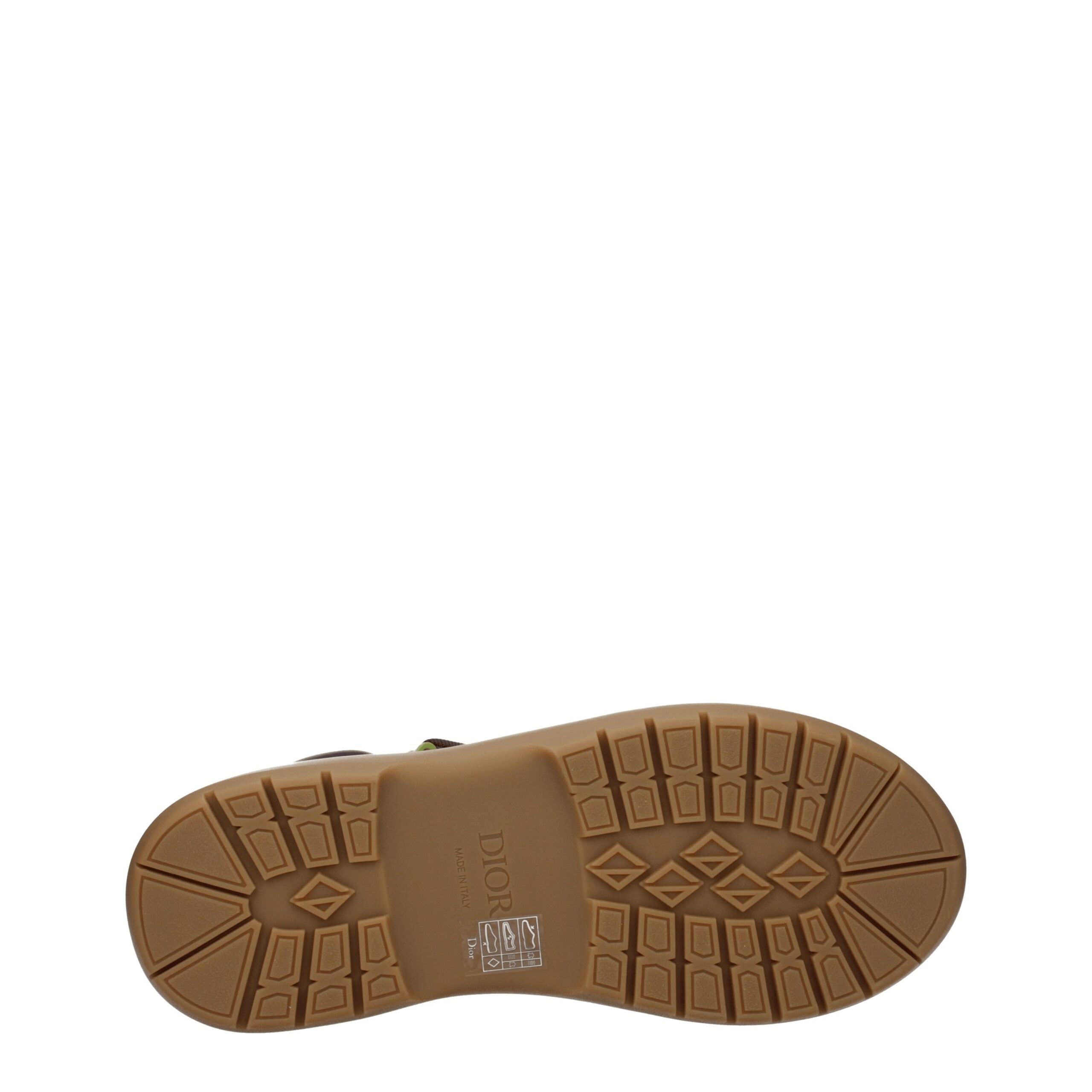Bottes haut de la cheville en cuir beige de Christian Dior, élégantes et sophistiquées, pour un style chic et moderne.