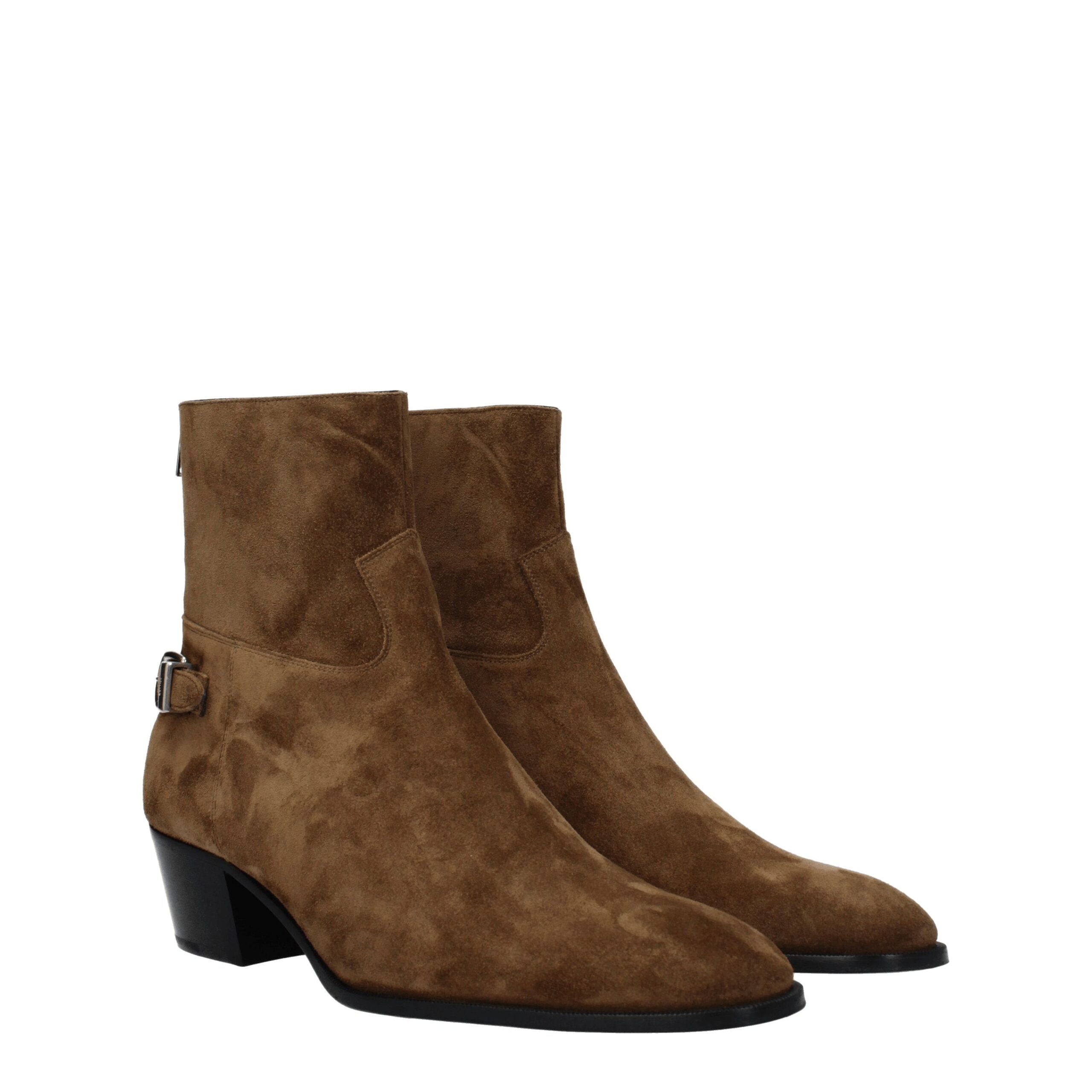 Chaussures bottines en cuir marron Celine pour femme, semelle en caoutchouc et design élégant.