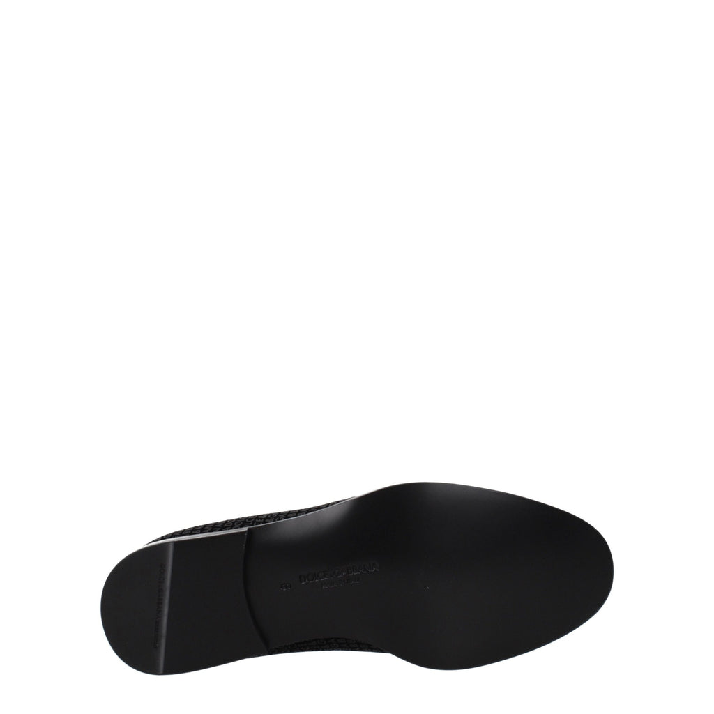 Chaussures slip-on en velours noir Dolce & Gabbana, loafers élégants pour homme ou femme, en tissu doux et sophistiqué.
