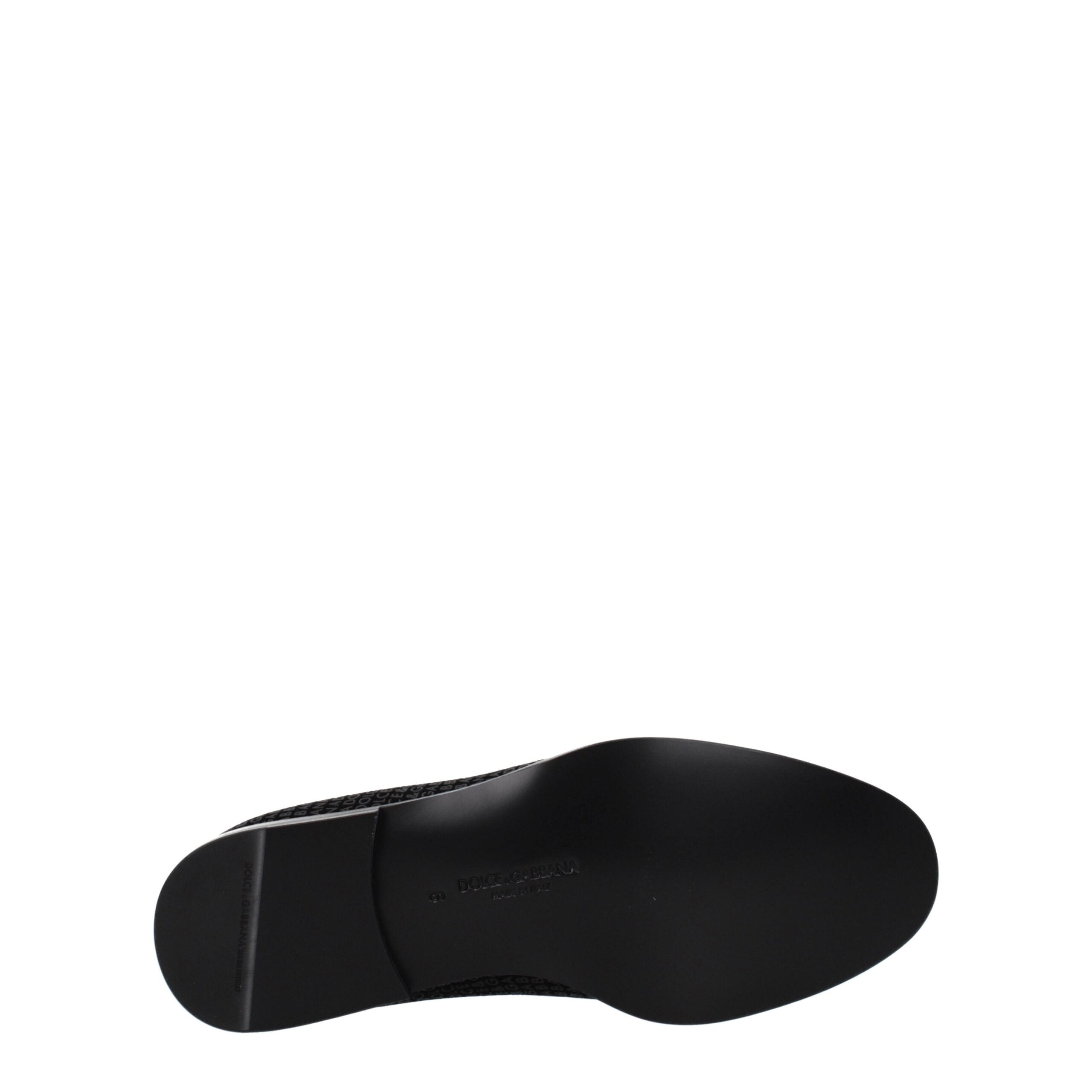 Chaussures slip-on en velours noir Dolce & Gabbana, loafers élégants pour homme ou femme, en tissu doux et sophistiqué.