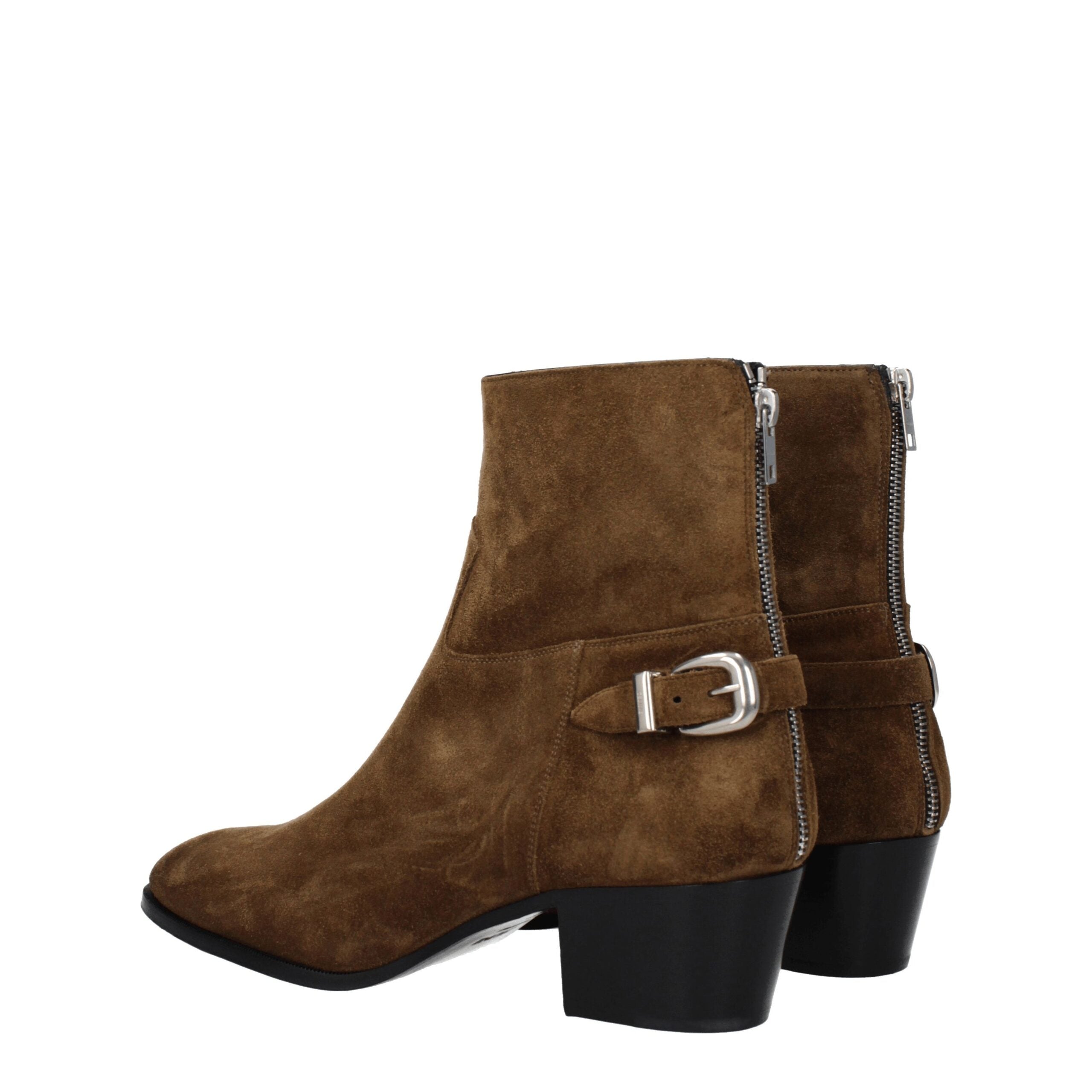 Bottes Chelsea en cuir marron de Celine, ankle boots élégantes avec talon modéré et finition lisse.