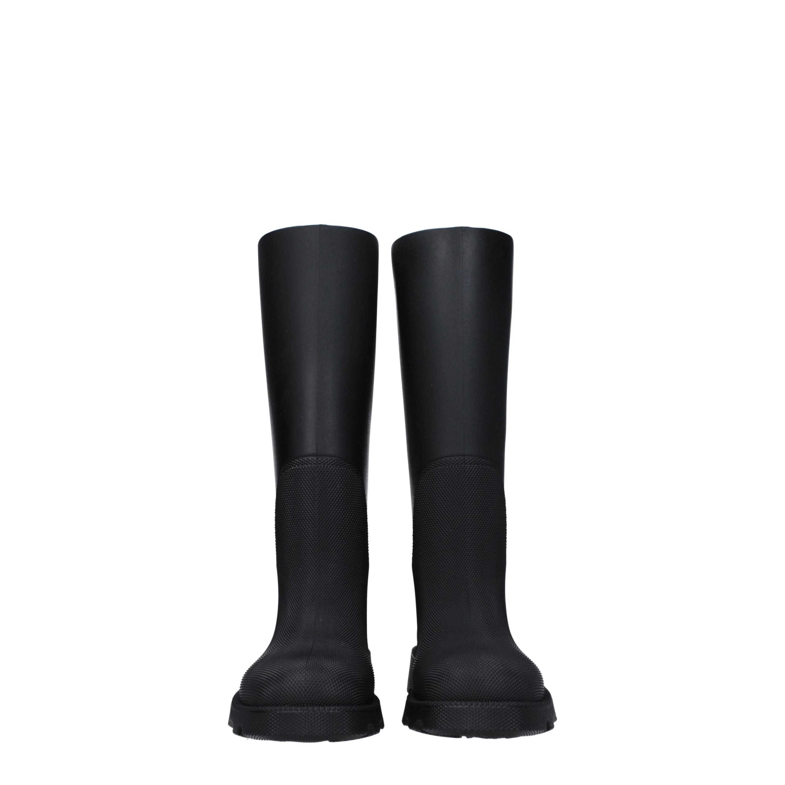 Bottes de pluie en coton noir de la marque Burberry, avec logo emblématique sur le côté, conçues pour la pluie et l’extérieur.