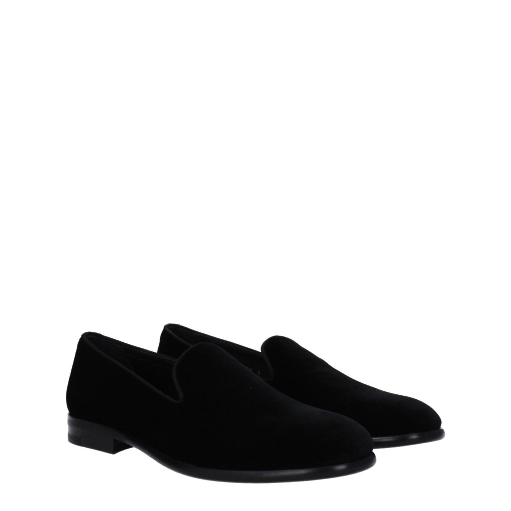 Chaussures Dolce & Gabbana en velours noir, loafers à enfiler élégants avec finition sophistiquée.