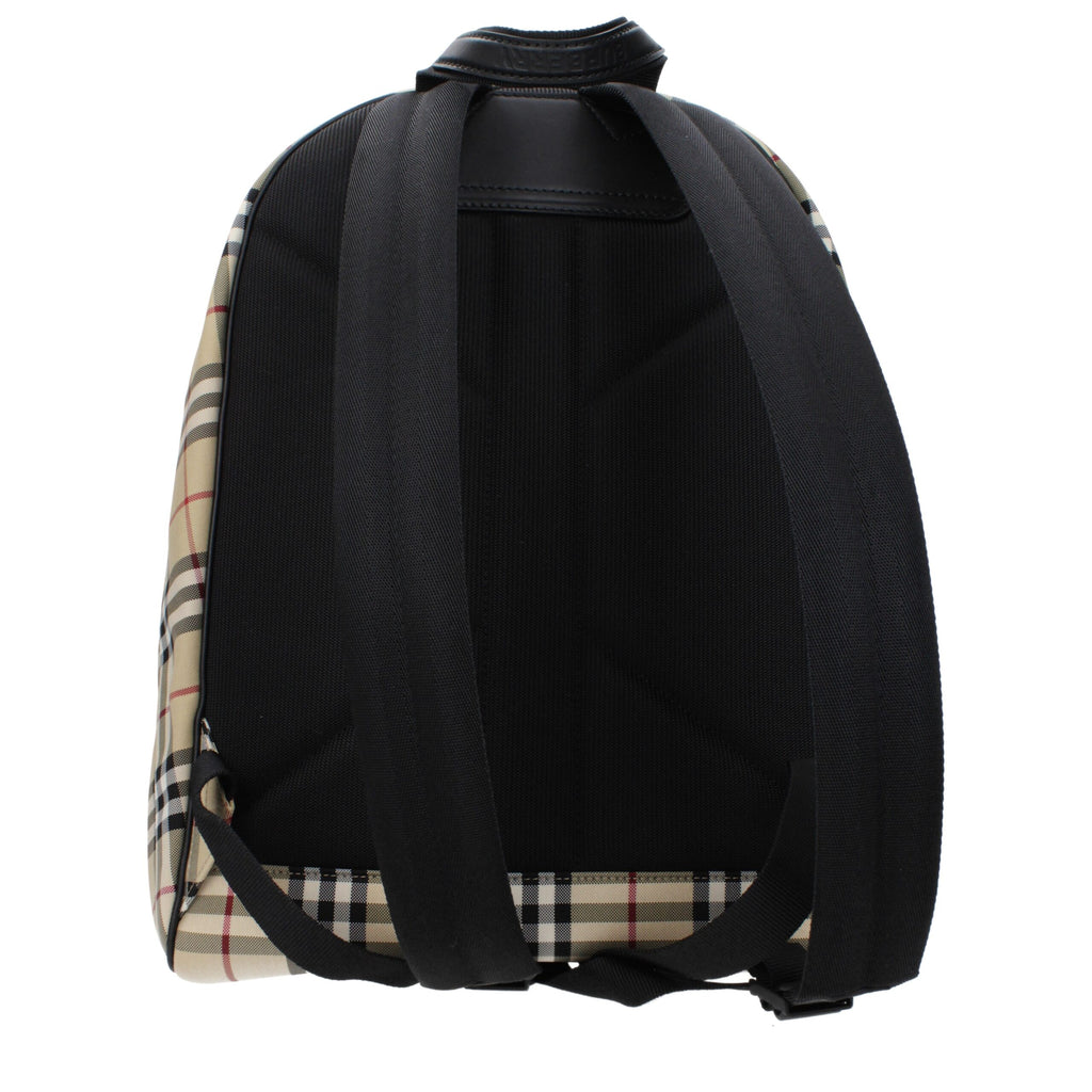 Sac à dos en tissu beige de la marque Burberry, avec logo emblématique, poignées en cuir et design élégant.