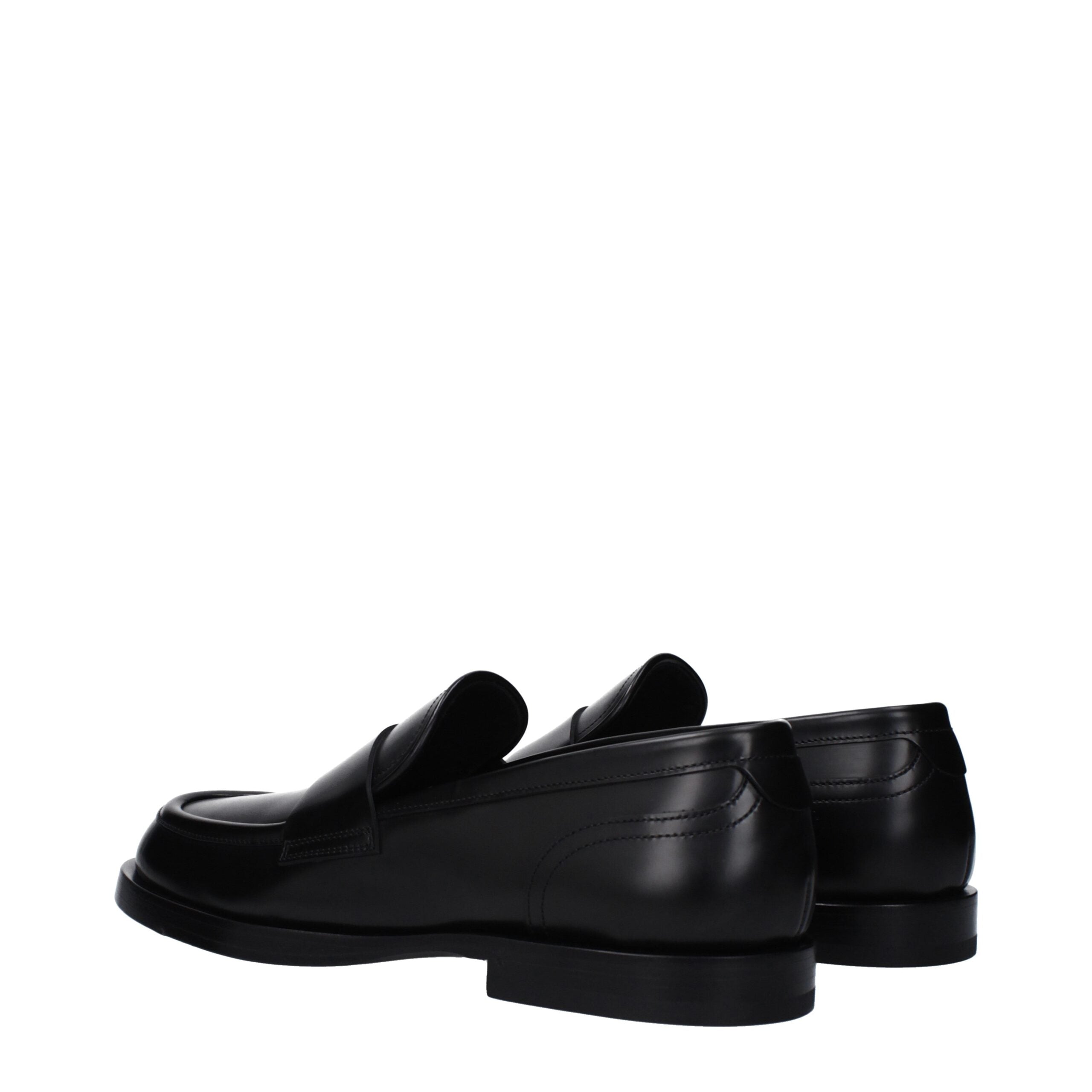 Mocassins en cuir noir Dolce & Gabbana pour homme, slip-on, avec semelle en cuir et design élégant.