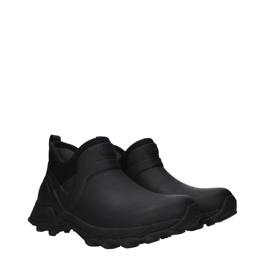 Bottines noires en coton de la marque Givenchy, ankle hautes, avec semelle élégante et design moderne.
