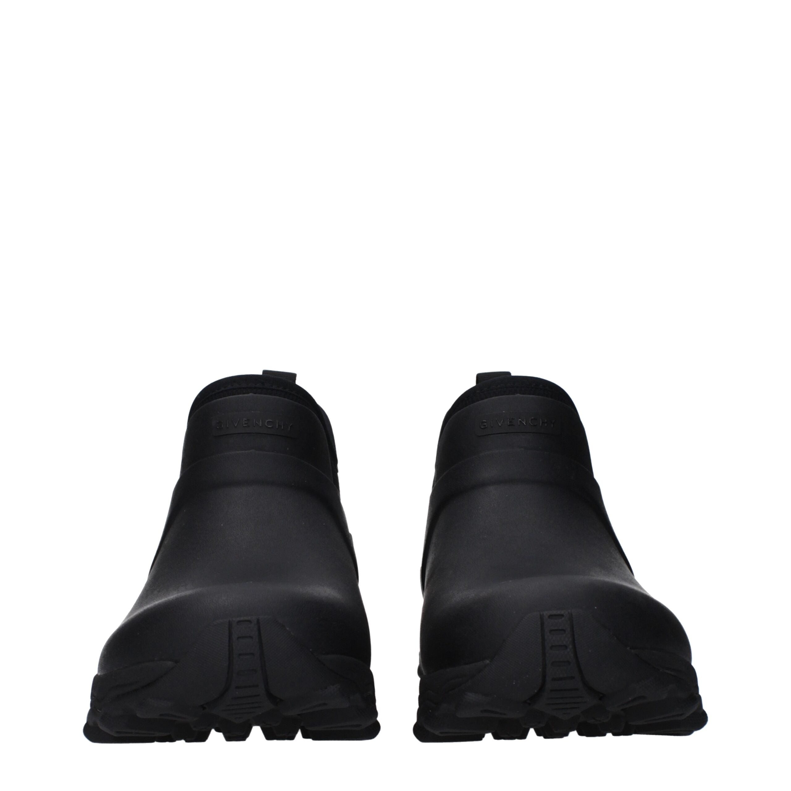 Bottes à cheville en coton noir de la marque Givenchy, vue de côté avec détails modernes et élégants.