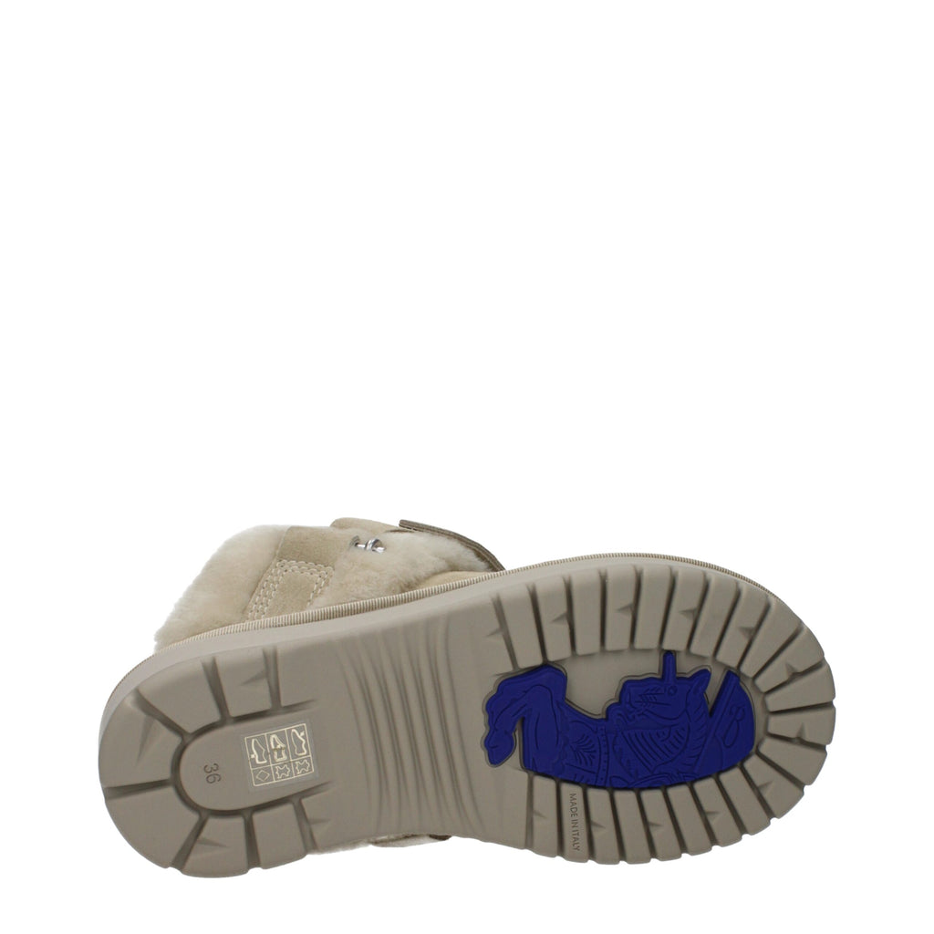 Chaussures décontractées en cuir vert de Burberry, slippers élégants avec logo de la marque.
