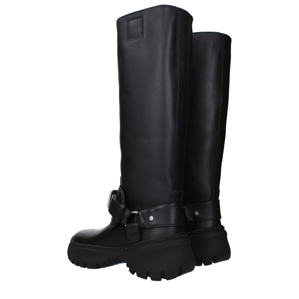 Bottes en cuir noires Burberry, élégantes et sophistiquées, avec détails en cuir brillant et semelle en caoutchouc.