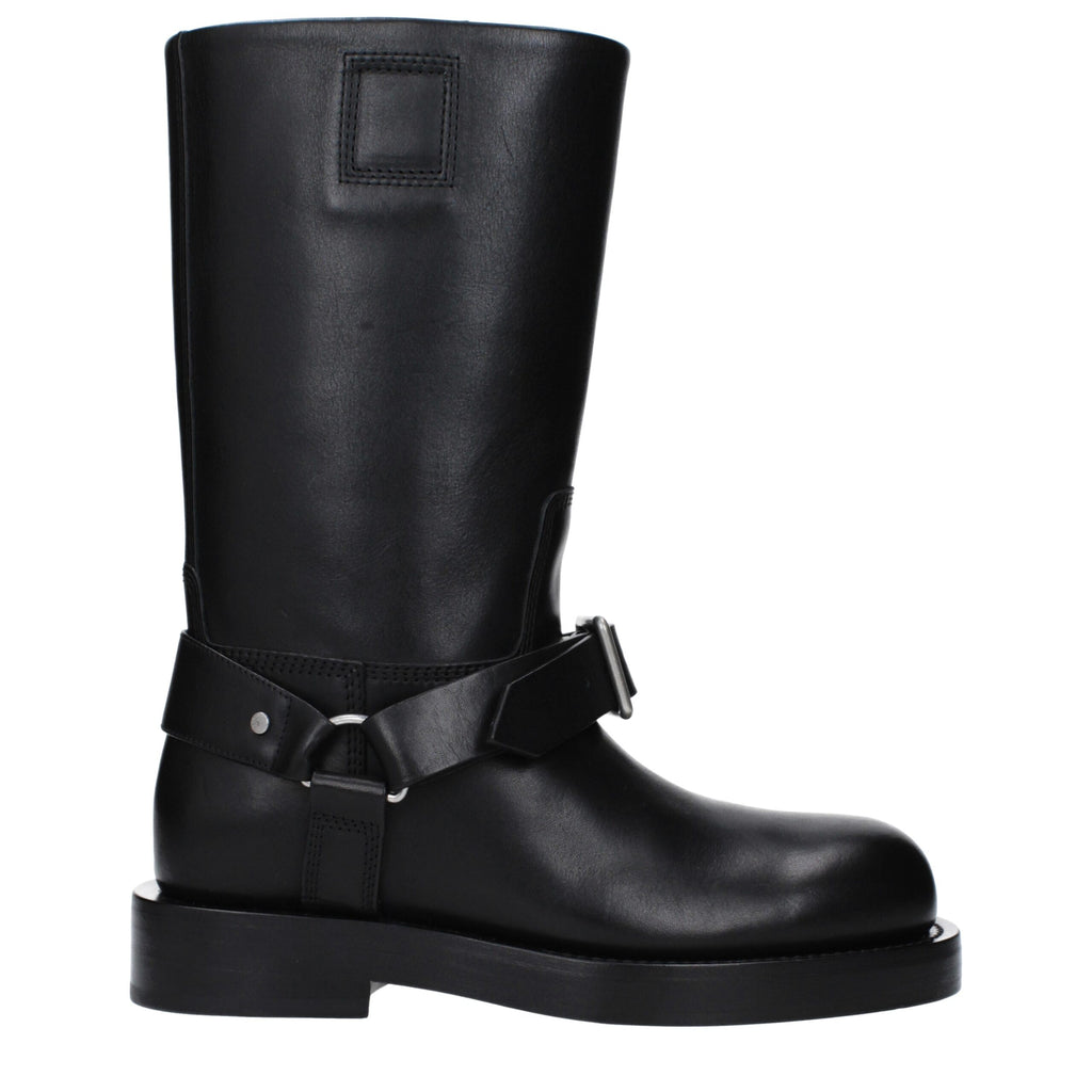 Bottes en cuir noir Burberry pour femme, style élégant avec semelle robuste et finition de haute qualité.