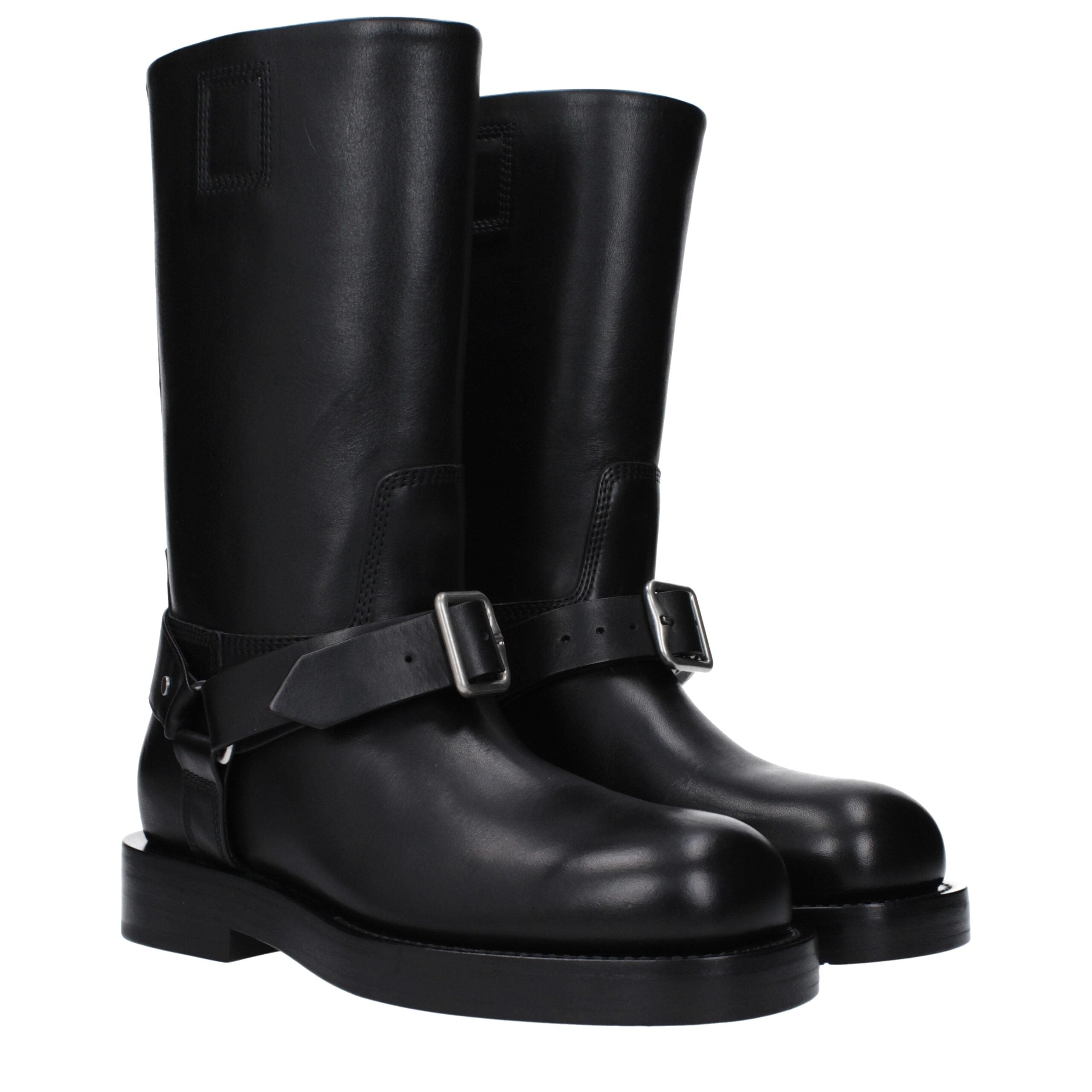 Bottes en cuir noir Burberry pour femme, élégantes et sophistiquées, avec détails en cuir et semelle en caoutchouc.