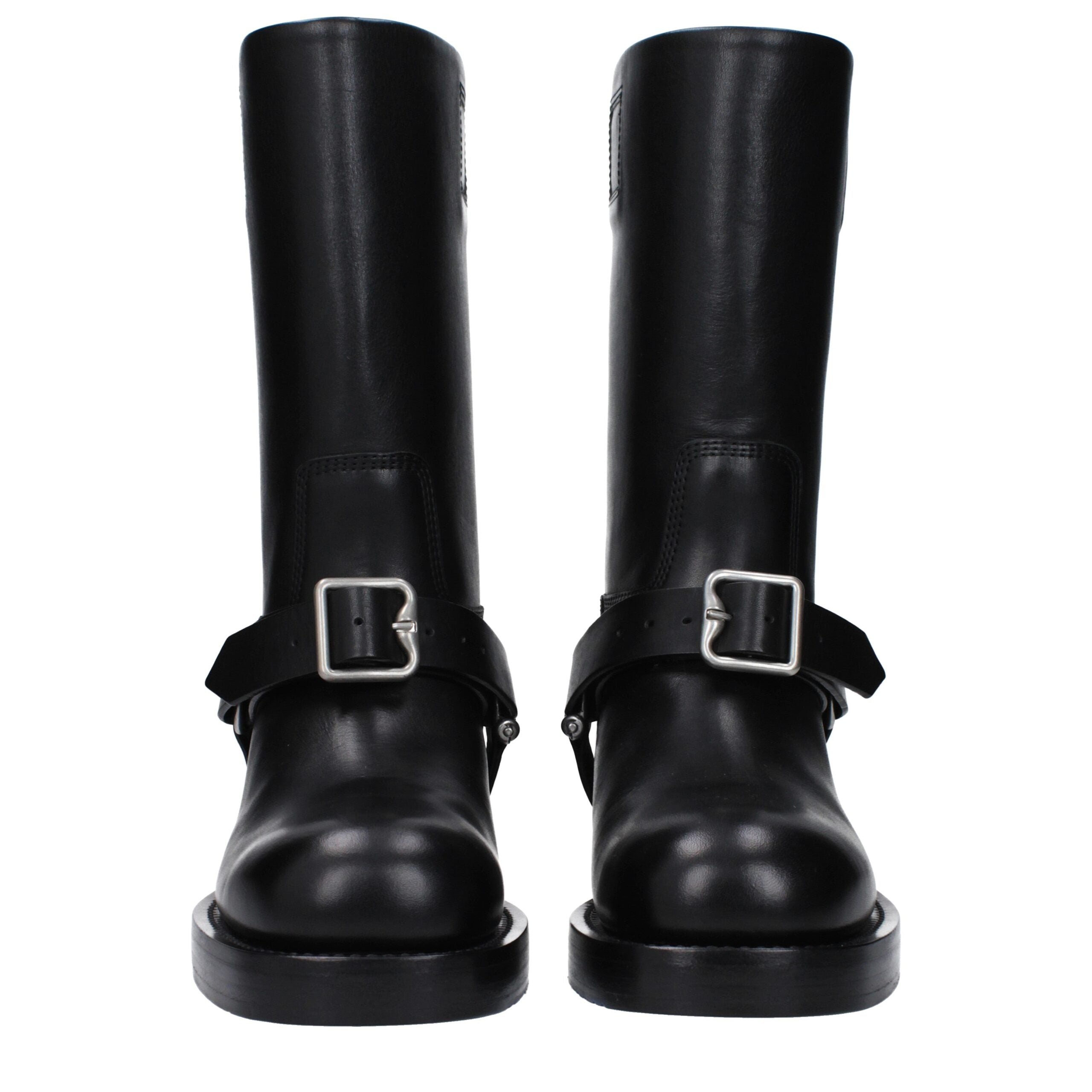 Bottes en cuir noir Burberry pour femme, design élégant avec détails sophistiqués et semelle en caoutchouc.