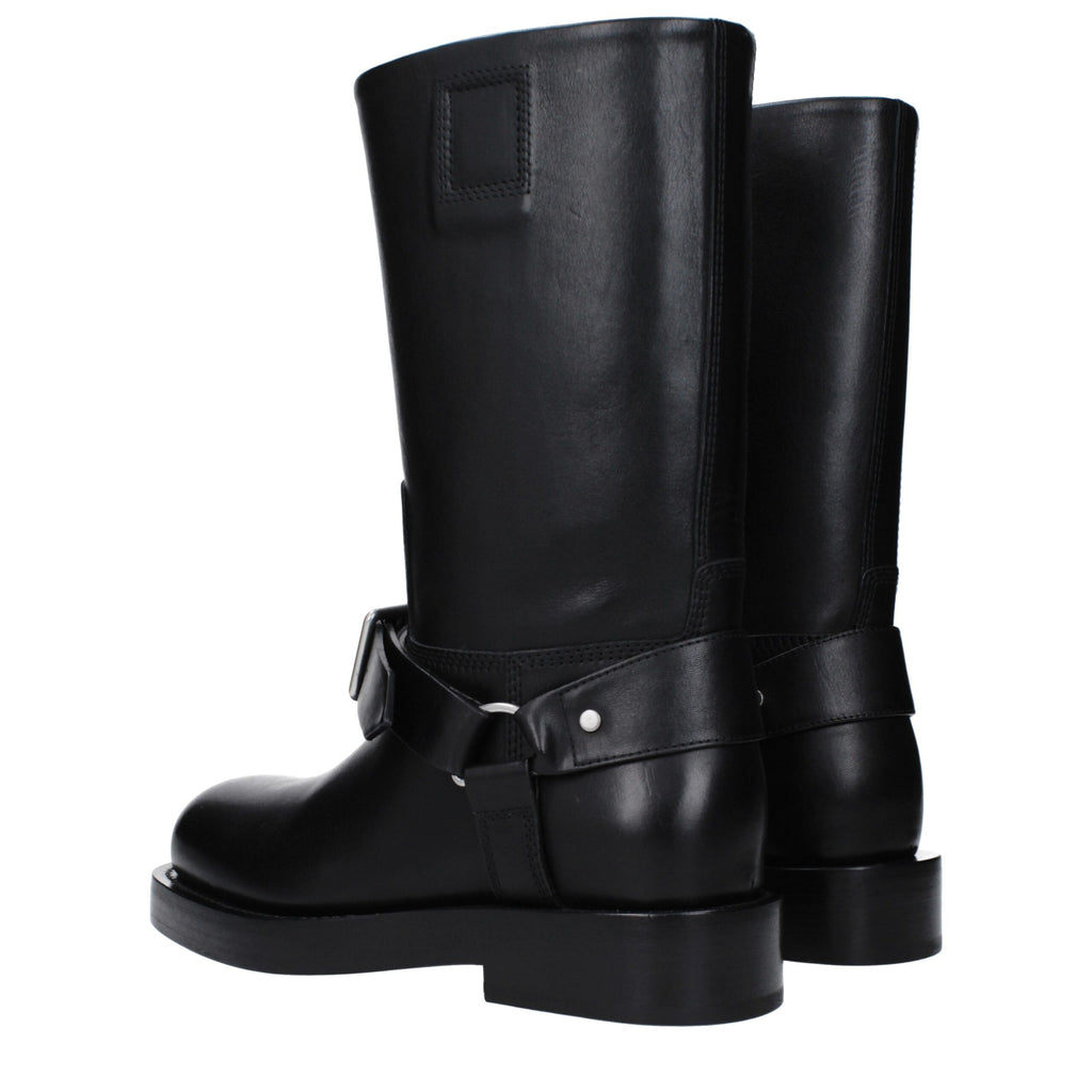 Bottes en cuir noir Burberry pour femmes, élégantes et sophistiquées, avec des détails en cuir de haute qualité.