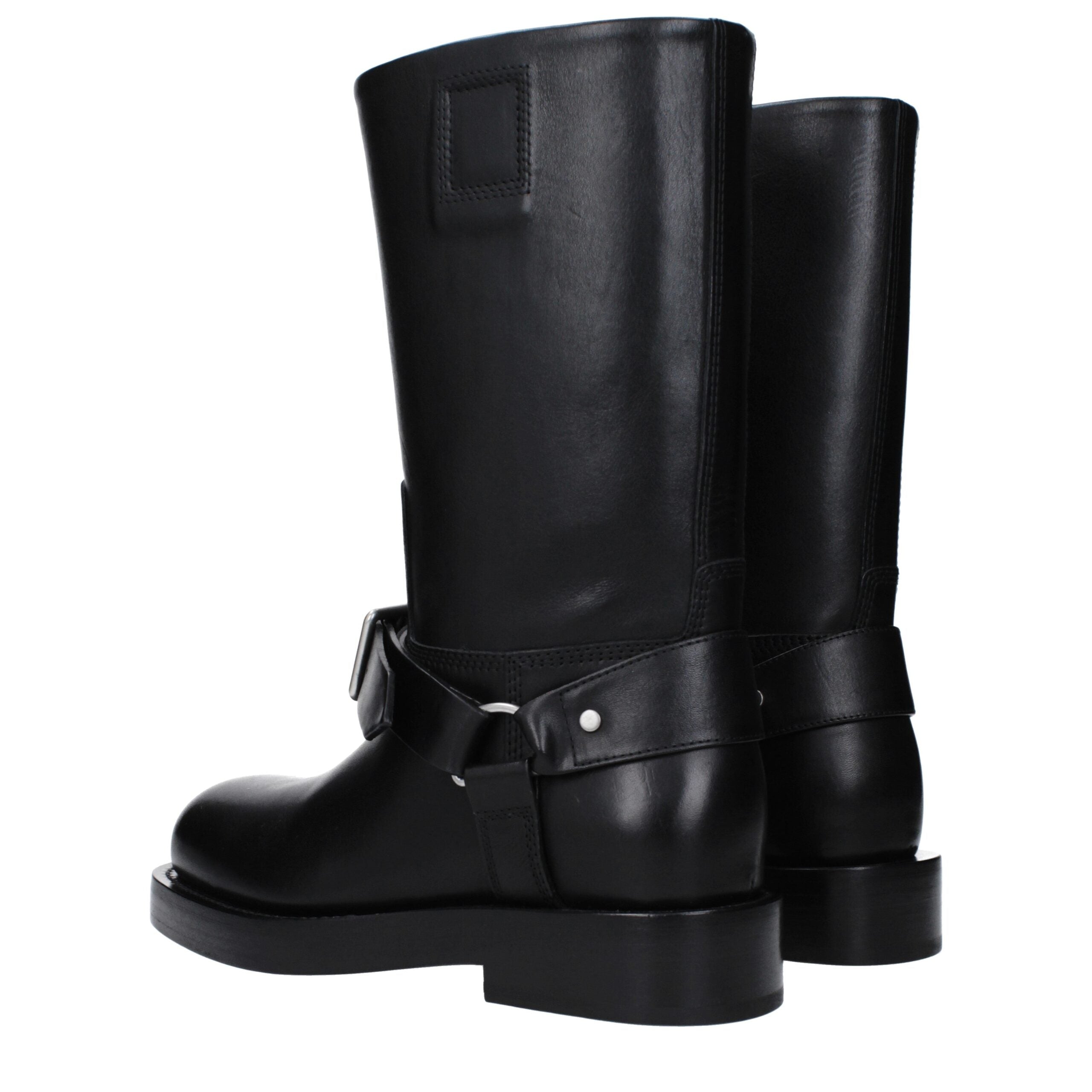 Bottes en cuir noir Burberry pour femmes, élégantes et sophistiquées, avec des détails en cuir de haute qualité.